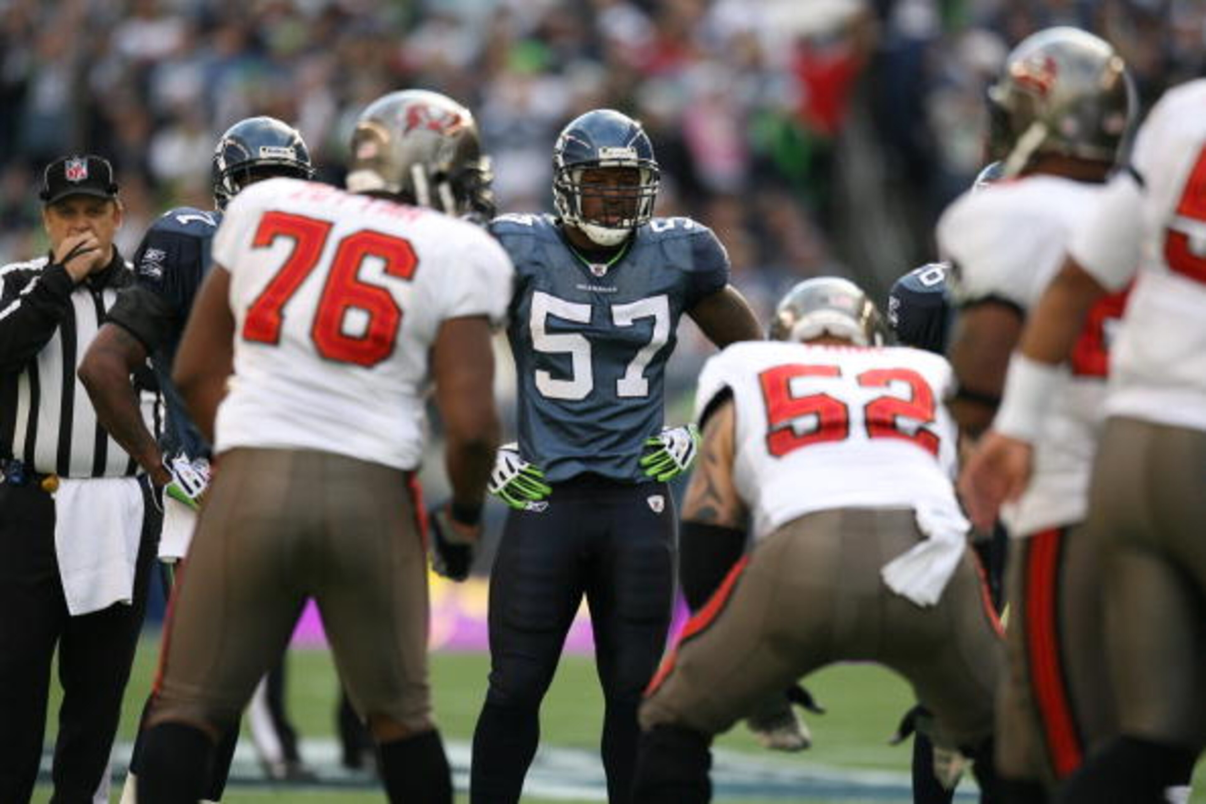 SEATTLE - DECEMBER 20:  David Hawthorne #57 of the Seattle Seahawks looks on during their game against the Tampa Bay Buccaneers on December 20, 2009 at Qwest Field in Seattle, Washington. The Buccaneers defeated the Seahawks 24-7. (Photo by Otto Greule Jr