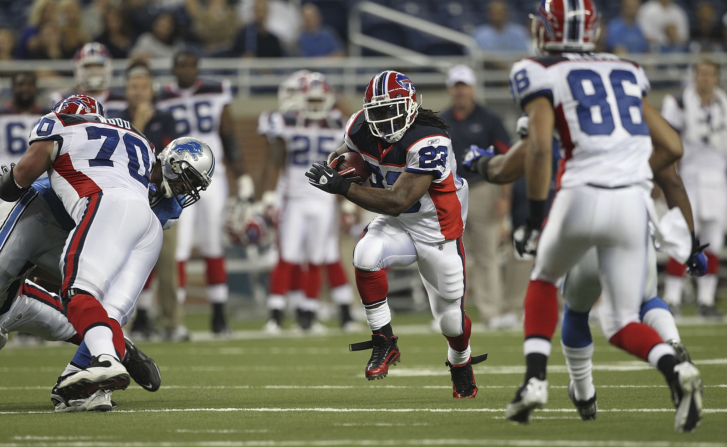DETROIT - SEPTEMBER 02: Marshawn Lynch #23 of the Buffalo Bills runs for a short gain during the second quarter of the preseason game against the Detroit Lions at Ford Field on September 2, 2010 in Detroit, Michigan.  (Photo by Leon Halip/Getty Images)