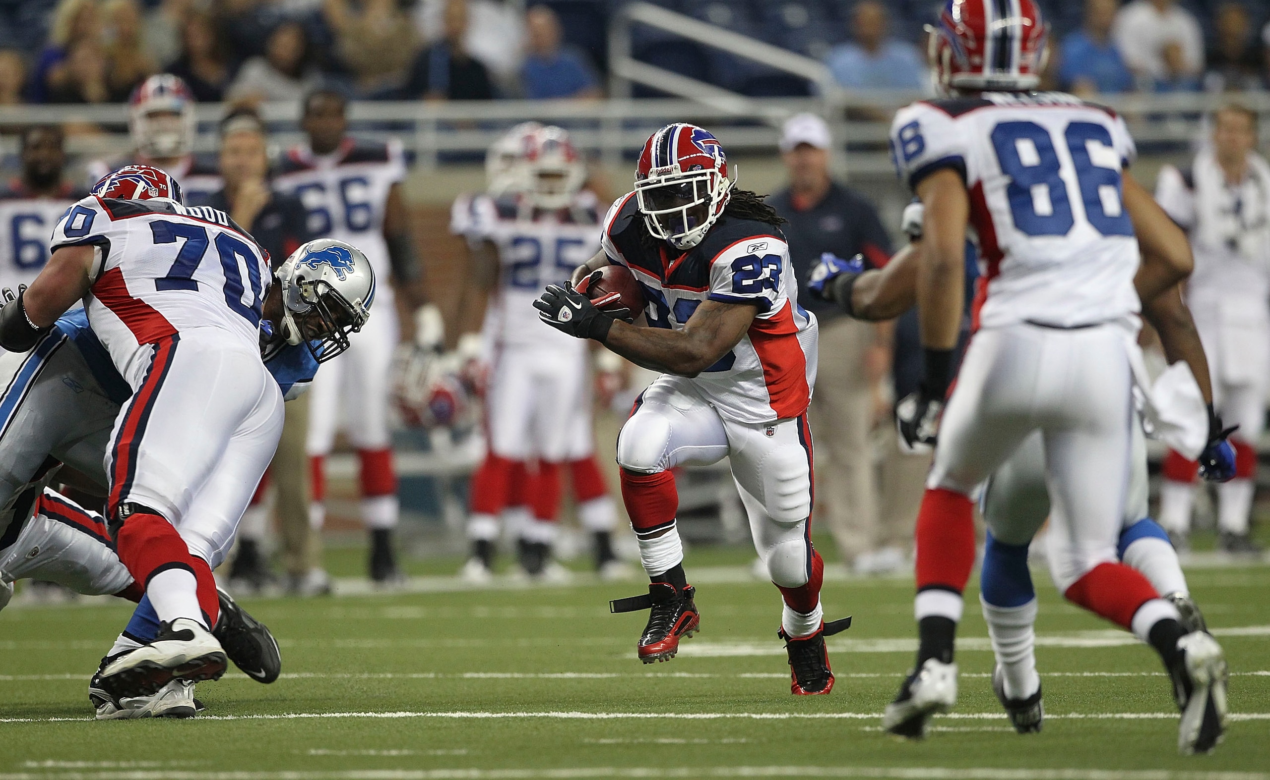 DETROIT - SEPTEMBER 02: Marshawn Lynch #23 of the Buffalo Bills runs for a short gain during the second quarter of the preseason game against the Detroit Lions at Ford Field on September 2, 2010 in Detroit, Michigan.  (Photo by Leon Halip/Getty Images)
