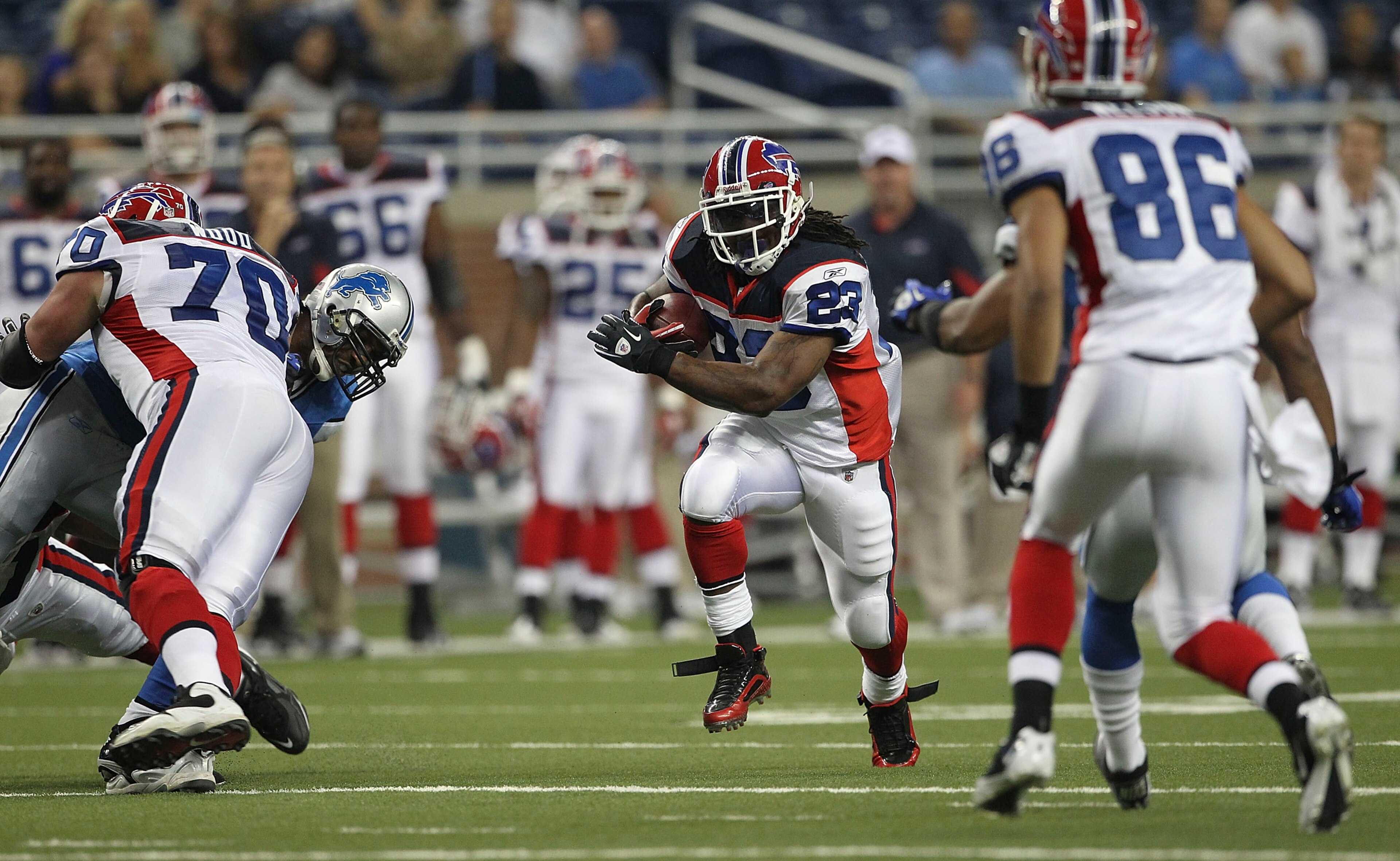 DETROIT - SEPTEMBER 02: Marshawn Lynch #23 of the Buffalo Bills runs for a short gain during the second quarter of the preseason game against the Detroit Lions at Ford Field on September 2, 2010 in Detroit, Michigan.  (Photo by Leon Halip/Getty Images)