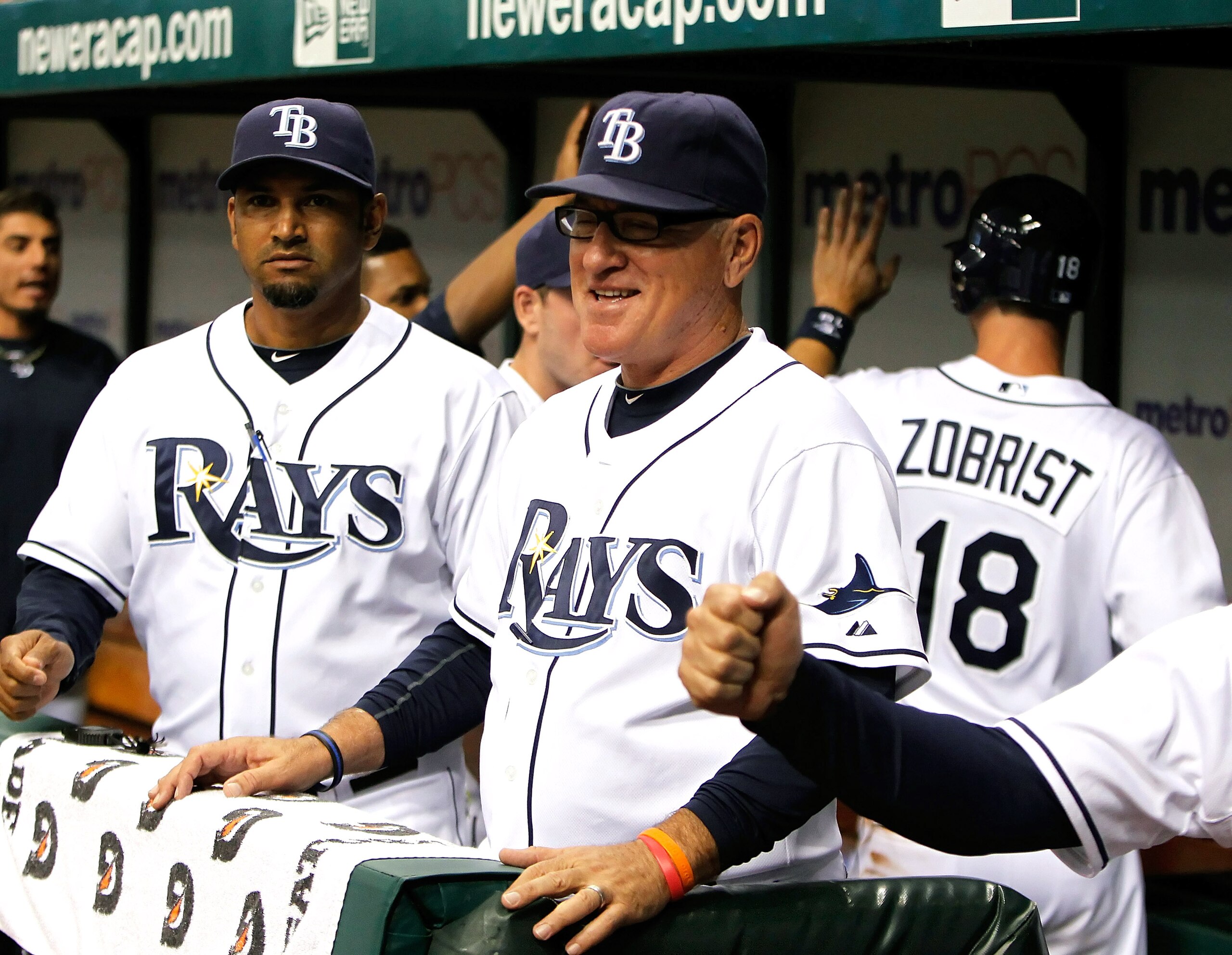 ST. PETERSBURG - AUGUST 31:  Manager Joe Maddon #70 of the Tampa Bay Rays smiles after his team scored a run against the Toronto Blue Jays during the game at Tropicana Field on August 31, 2010 in St. Petersburg, Florida.  (Photo by J. Meric/Getty Images)