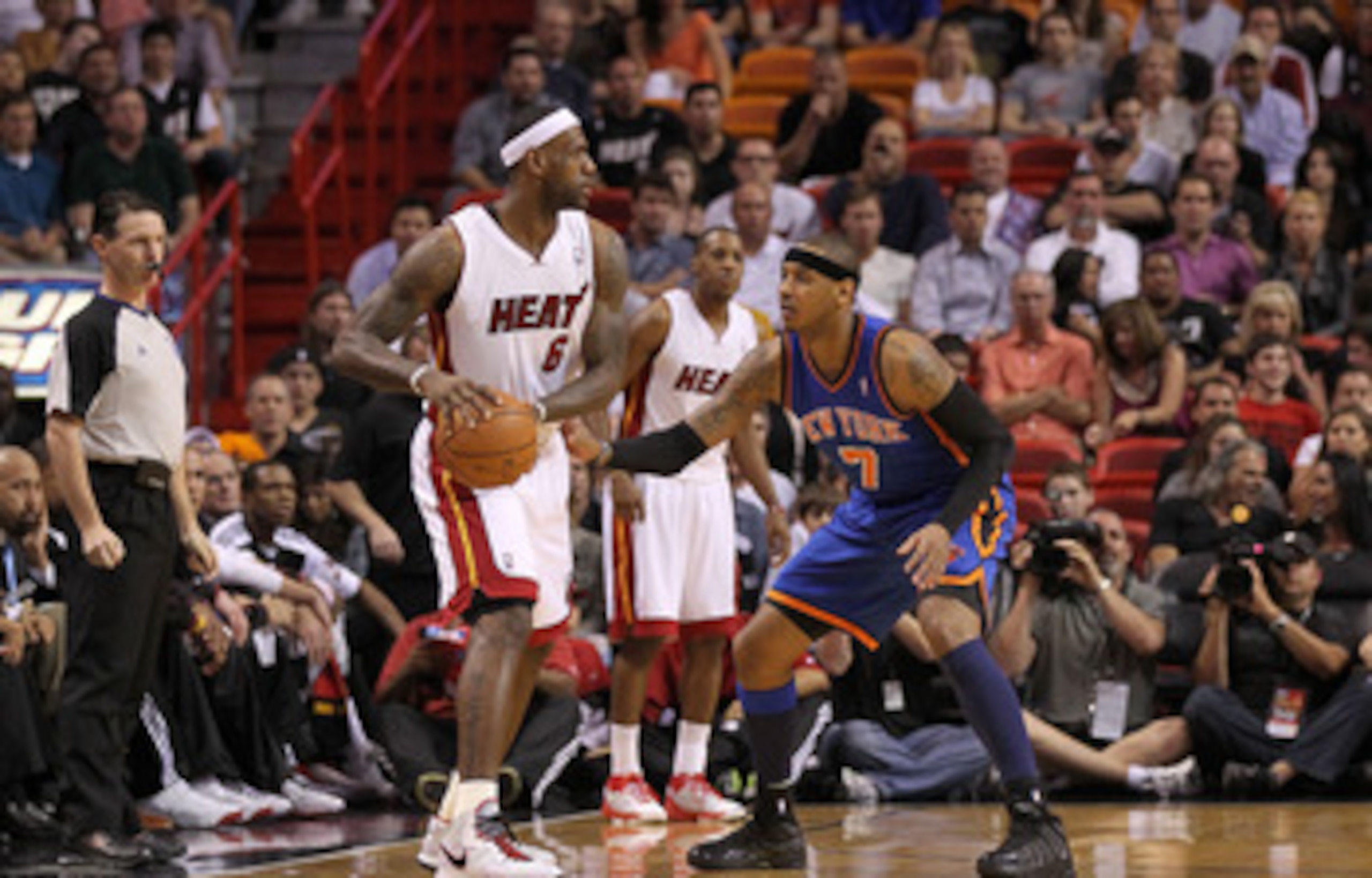 MIAMI, FL - FEBRUARY 27:  LeBron James #6 of the Miami Heat is guarded by Carmelo Anthony #7 of the New York Knicks looks on during a game at American Airlines Arena on February 27, 2011 in Miami, Florida. NOTE TO USER: User expressly acknowledges and agr