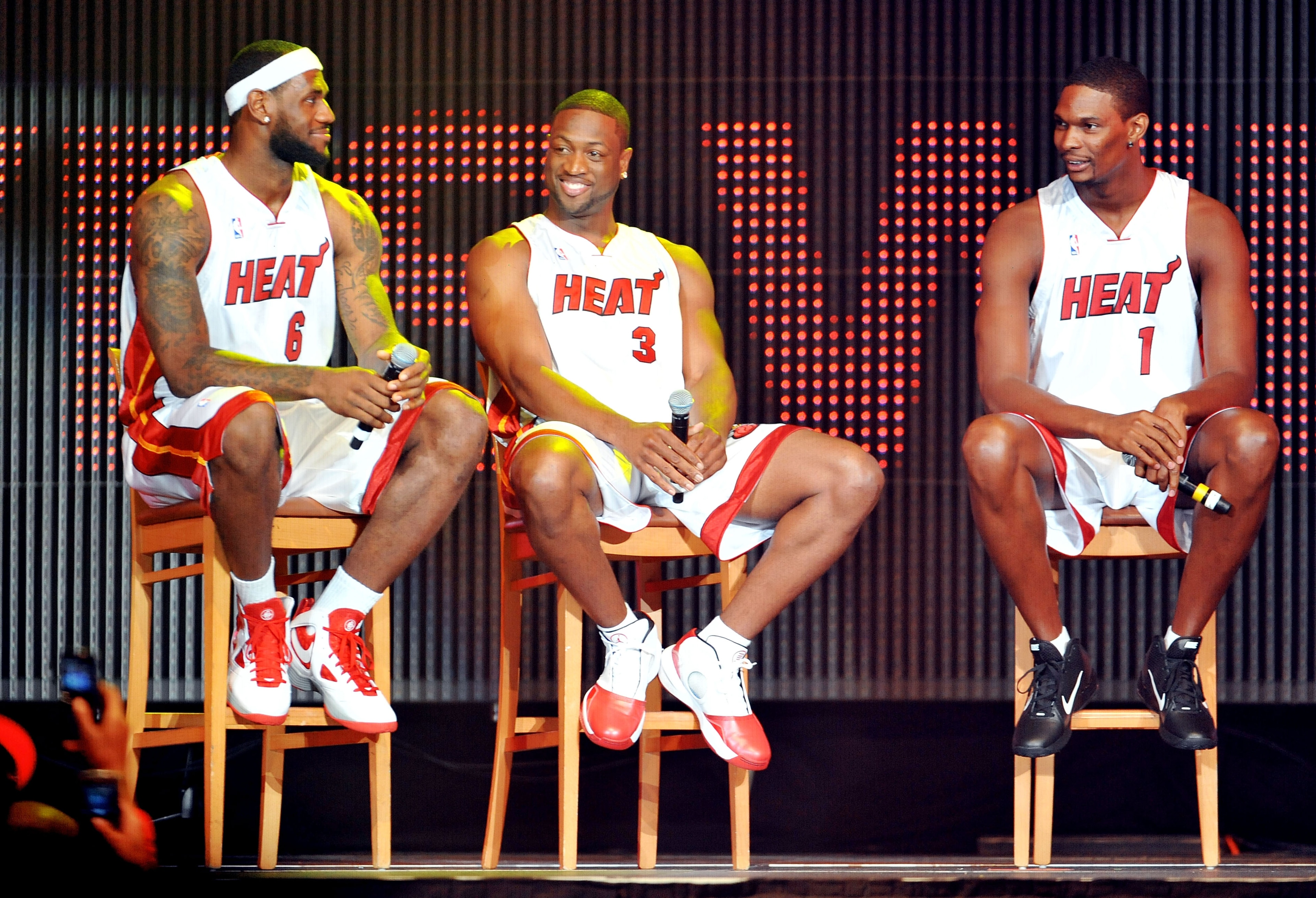 MIAMI - JULY 09: LeBron James #6, Dwyane Wade #3 and Chris Bosh #1 of the Miami Heat speak after being introduced to fans during a welcome party at American Airlines Arena on July 9, 2010 in Miami, Florida. (Photo by Doug Benc/Getty Images) MIAMI - JULY 09: LeBron James #6, Dwyane Wade #3 and Chris Bosh #1 of the Miami Heat speak after being introduced to fans during a welcome party at American Airlines Arena on July 9, 2010 in Miami, Florida. (Photo by Doug Benc/Getty Images)