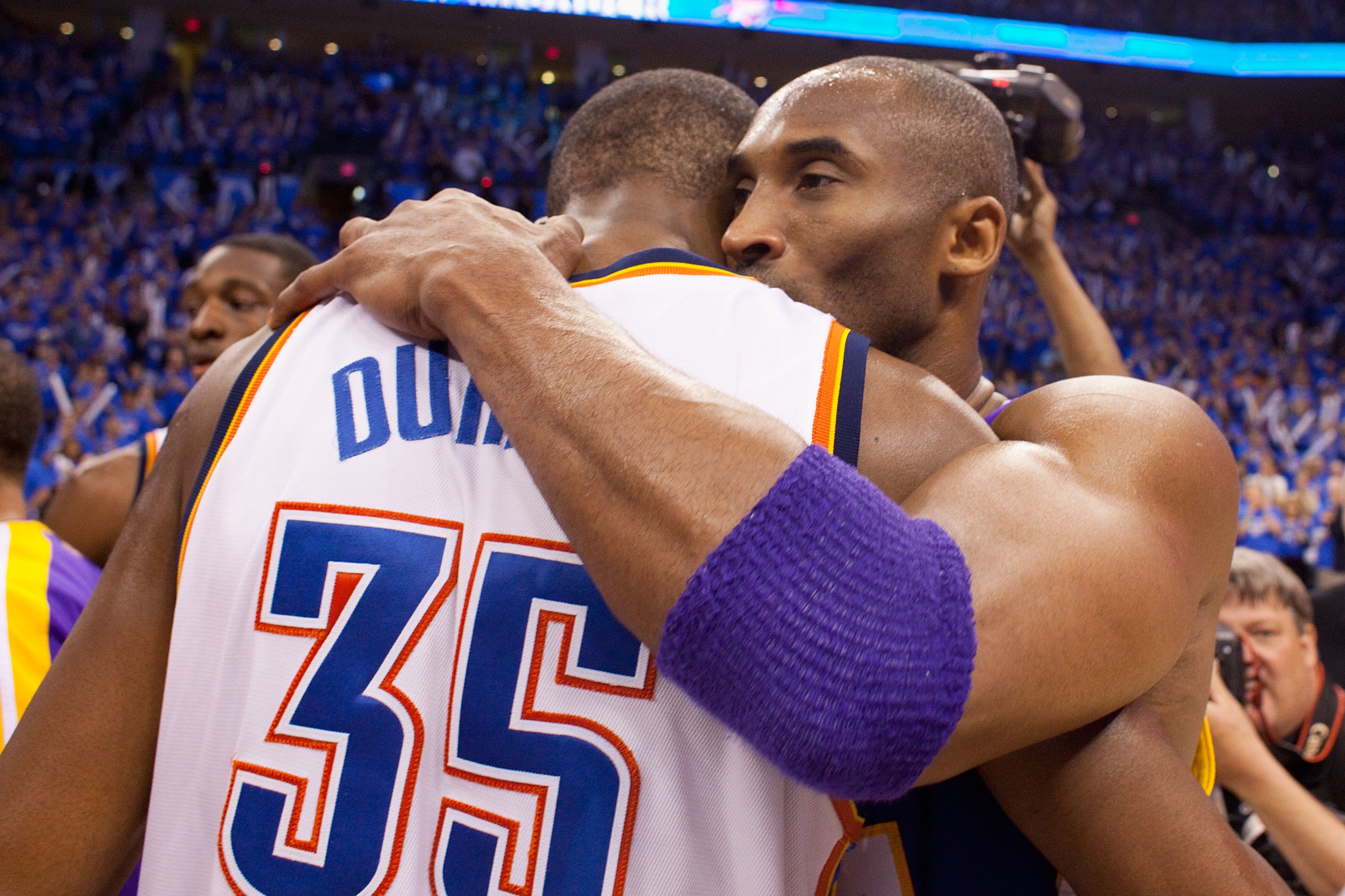 OKLAHOMA CITY - APRIL 30: Kobe Bryant #24 of the Los Angeles Lakers hugs Kevin Durant #35 of the Oklahoma City Thunder after after the Lakers won Game Six of the Western Conference Quarterfinals of the 2010 NBA Playoffs on April 30, 2010 at the Ford Cente OKLAHOMA CITY - APRIL 30: Kobe Bryant #24 of the Los Angeles Lakers hugs Kevin Durant #35 of the Oklahoma City Thunder after after the Lakers won Game Six of the Western Conference Quarterfinals of the 2010 NBA Playoffs on April 30, 2010 at the Ford Cente
