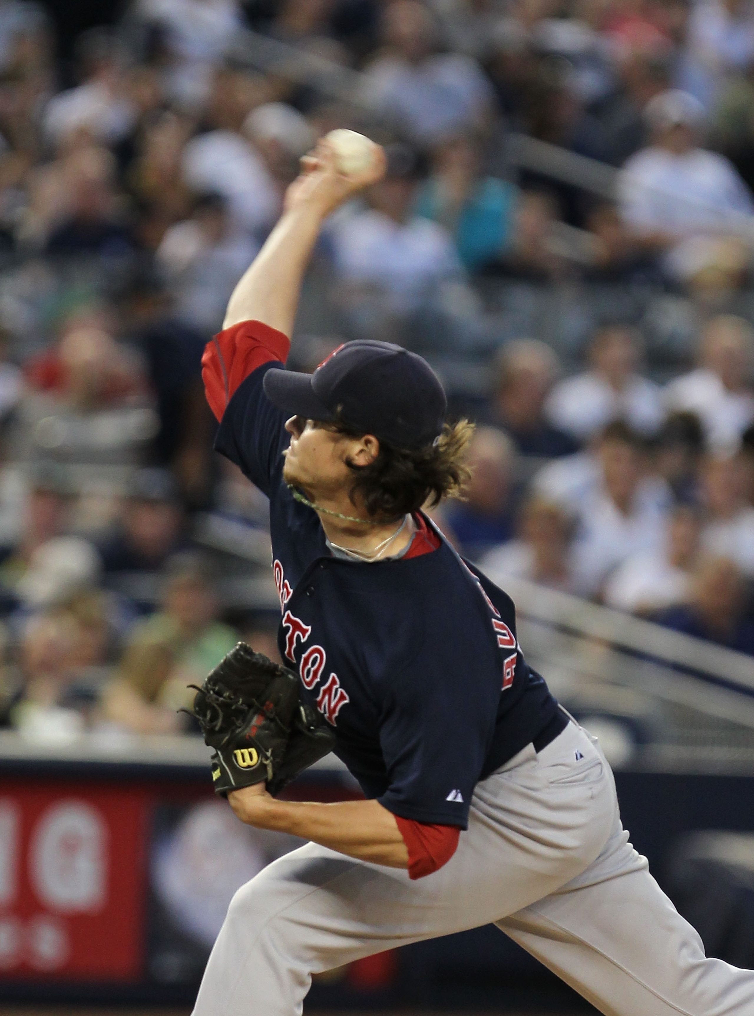 NEW YORK - AUGUST 06:  Clay Buchholz #11 of the Boston Red Sox pitches against the New York Yankees on August 6, 2010 at Yankee Stadium in the Bronx borough of New York City.  (Photo by Al Bello/Getty Images)