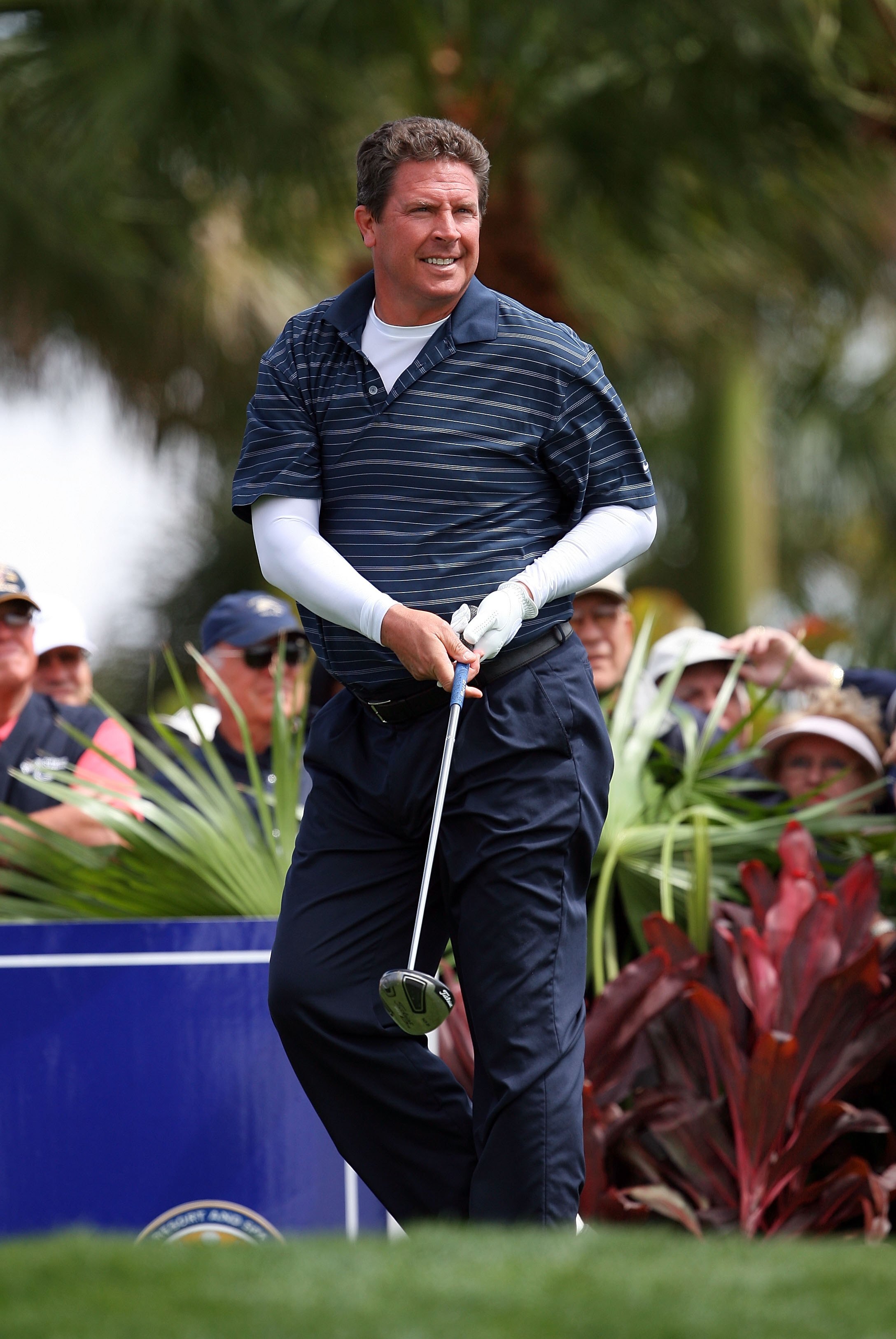 PALM BEACH GARDENS, FL - MARCH 03:  Hall-of-Fame NFL quarterback Dan Marino of the Miami Dolphins follows his tee shot on the first hole during the Honda Classic Kenny G Gold Pro-Am at PGA National Resort And Spa on March 3, 2010 in Palm Beach Gardens, Fl
