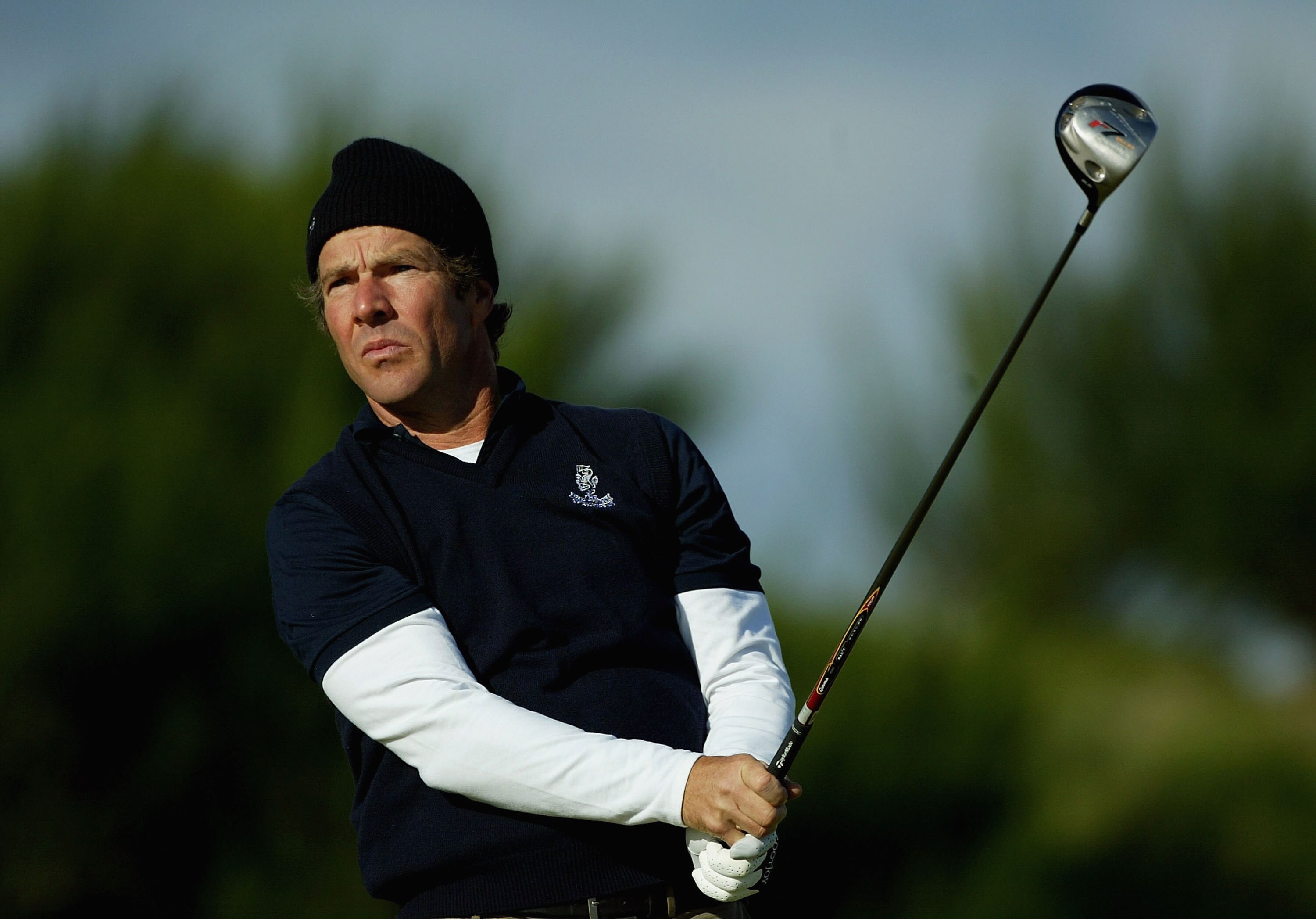 ST ANDREWS, GREAT BRITAIN - OCTOBER 07:  Actor Dennis Quaid tees off on the fifth hole during the first round of the Dunhill Links pictured at Kingsbarns Golf Club on October 7, 2004 in St Andrews, Fife, Scotland. (Photo by Warren Little/Getty Images)