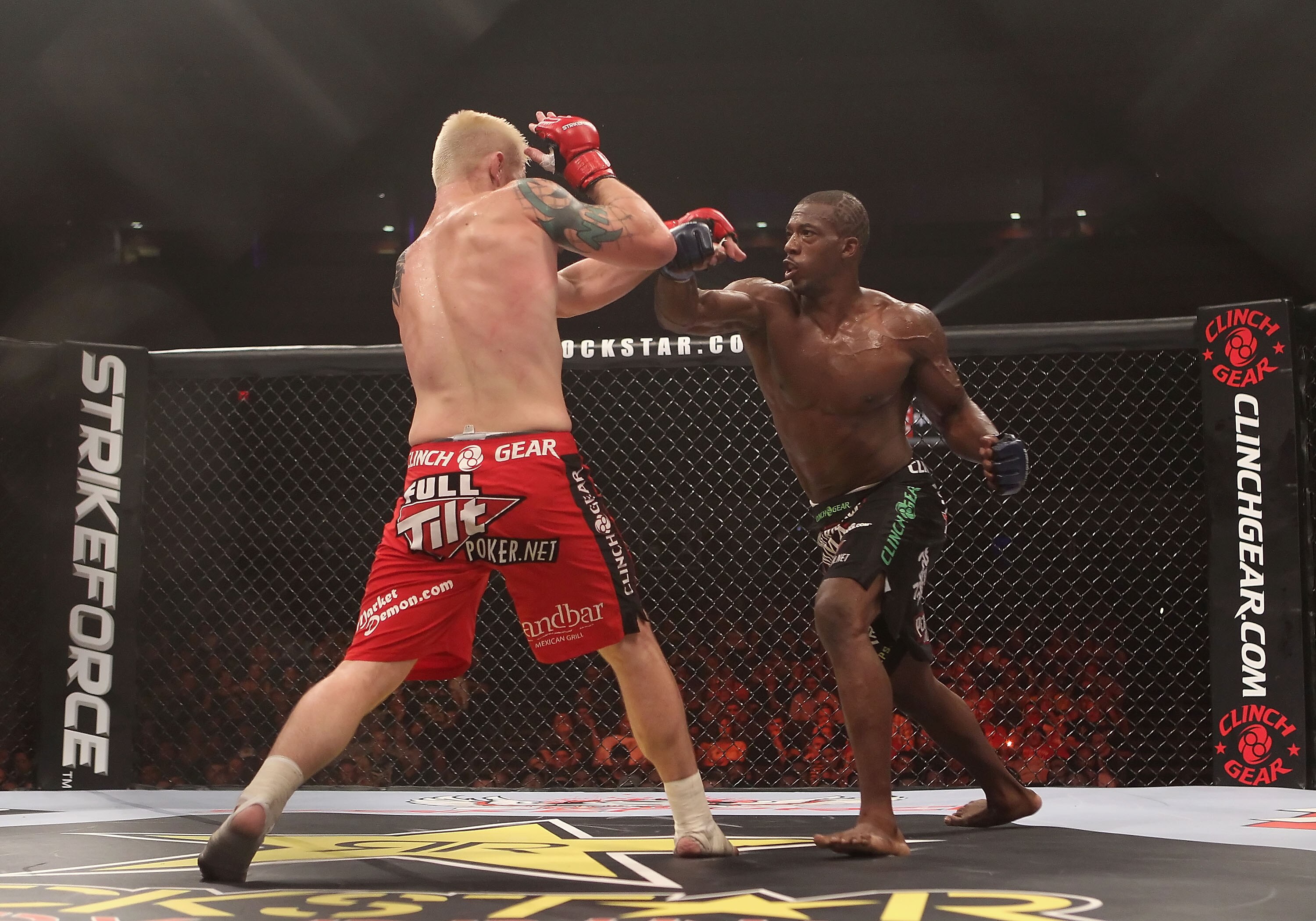 PHOENIX - AUGUST 13:  Louis Taylor (R) battles with Joe Riggs during the Strikeforce Challengers Men's Main card bout at Dodge Theater on August 13, 2010 in Phoenix, Arizona.  (Photo by Christian Petersen/Getty Images)