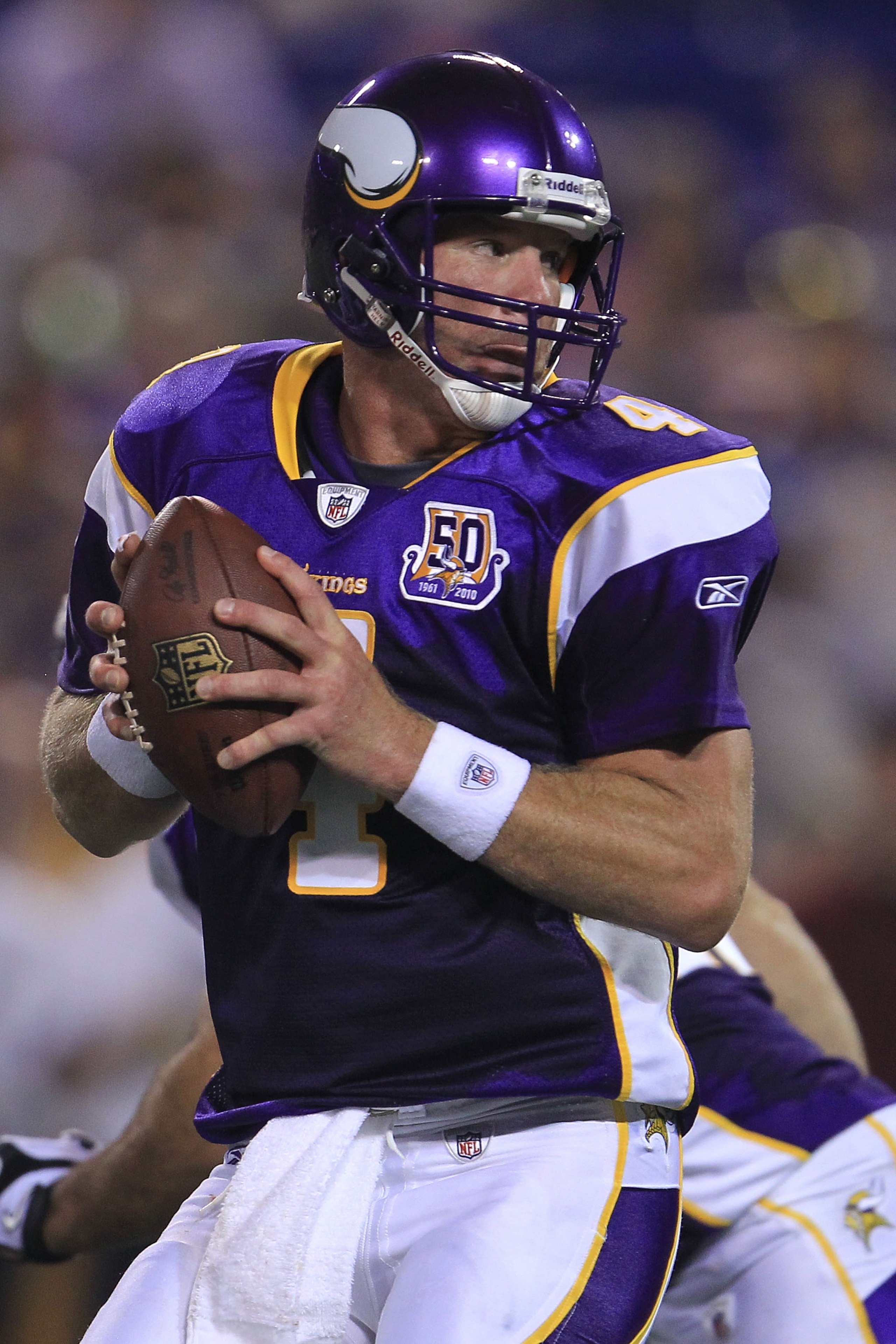 MINNEAPOLIS - AUGUST 28:  Brett Favre #4 of the Minnesota Vikings looks to pass against the Seattle Seahawks during a preseason NFL game at Mall of America Field at the Hubert H. Humphrey Metrodome on August 28, 2010  in Minneapolis, Minnesota.  (Photo by