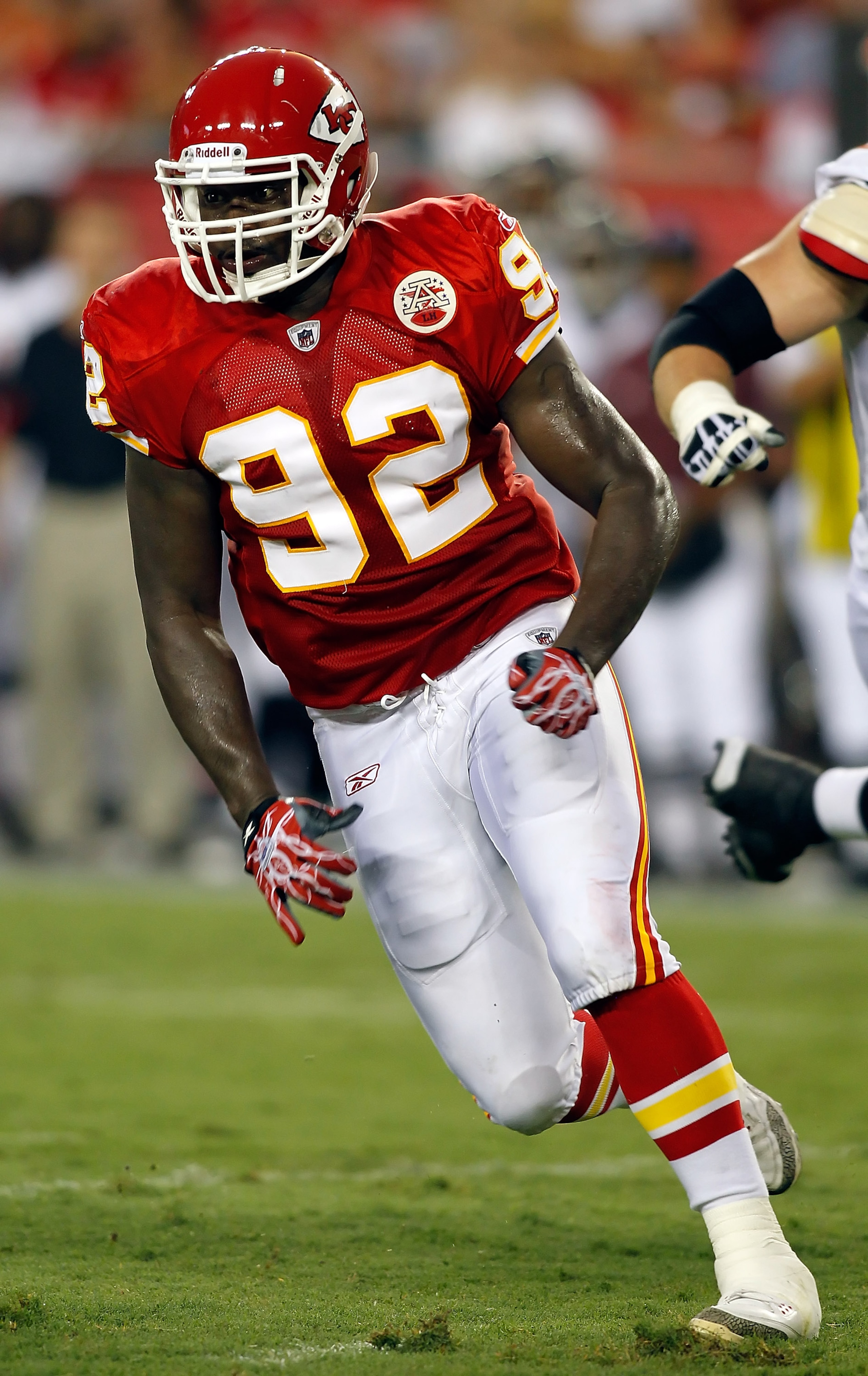 TAMPA, FL - AUGUST 21:  Defensive end Wallace Gilberry #92 of the Kansas City Chiefs looks to make a play against the Tampa Bay Buccaneers during a preseason game at Raymond James Stadium on August 21, 2010 in Tampa, Florida.  (Photo by J. Meric/Getty Ima