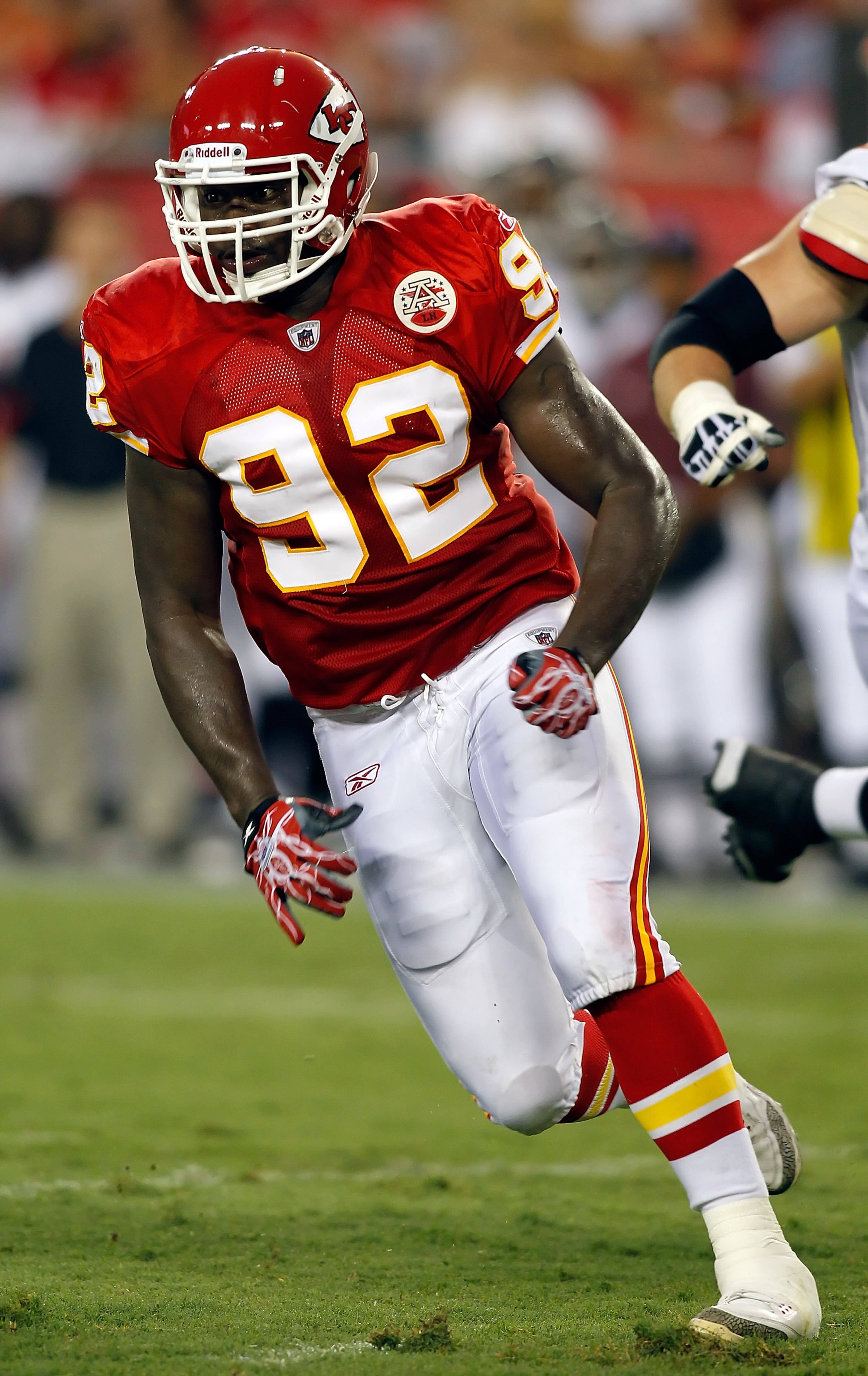 TAMPA, FL - AUGUST 21:  Defensive end Wallace Gilberry #92 of the Kansas City Chiefs looks to make a play against the Tampa Bay Buccaneers during a preseason game at Raymond James Stadium on August 21, 2010 in Tampa, Florida.  (Photo by J. Meric/Getty Ima