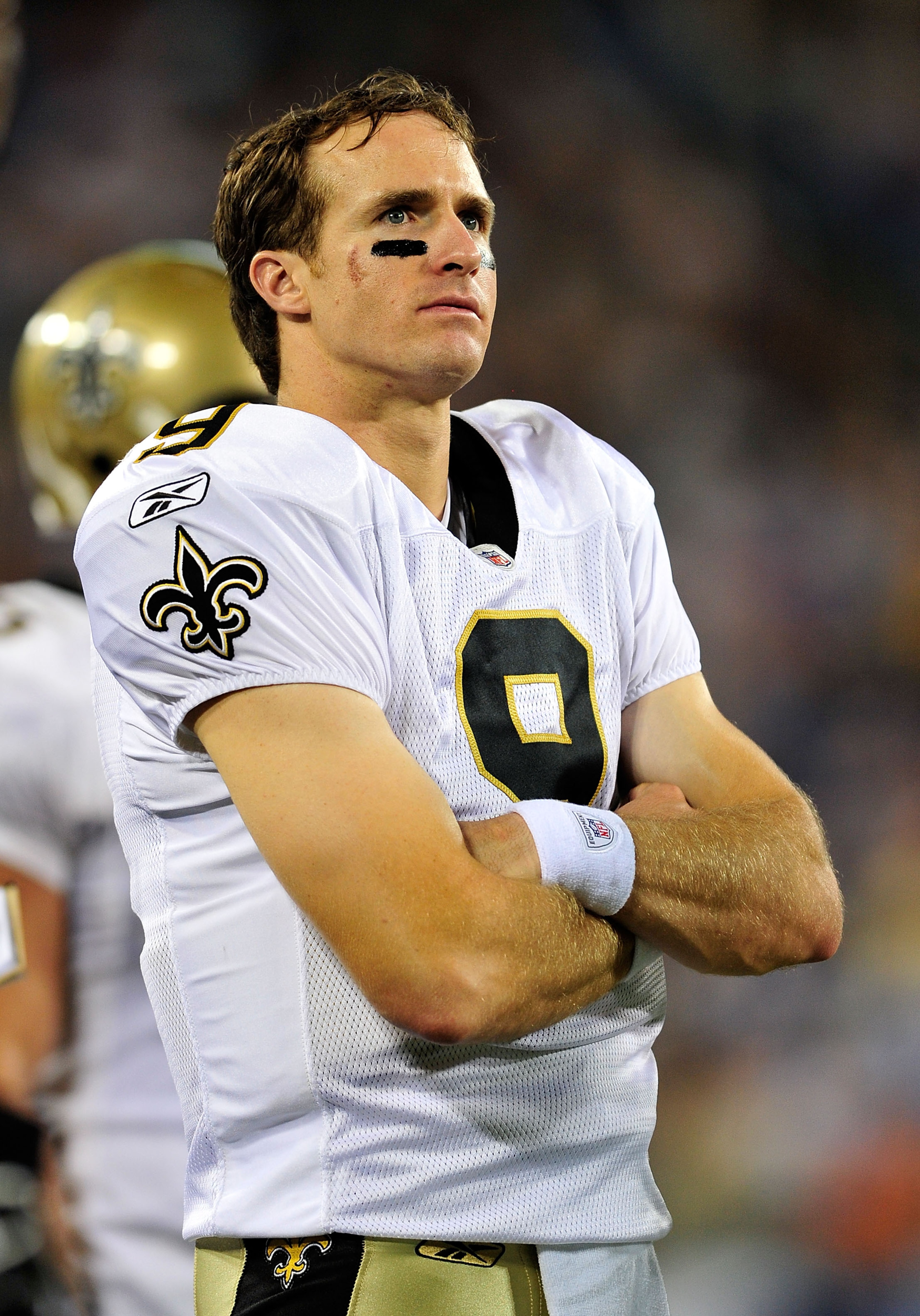 NASHVILLE, TN - SEPTEMBER 02:  Quarterback Drew Brees #9 of the New Orleans Saints, who did not play, watches during an exhibition game against the Tennessee Titans at LP Field on September 2, 2010 in Nashville, Tennessee. Tennessee won 27-24.  (Photo by