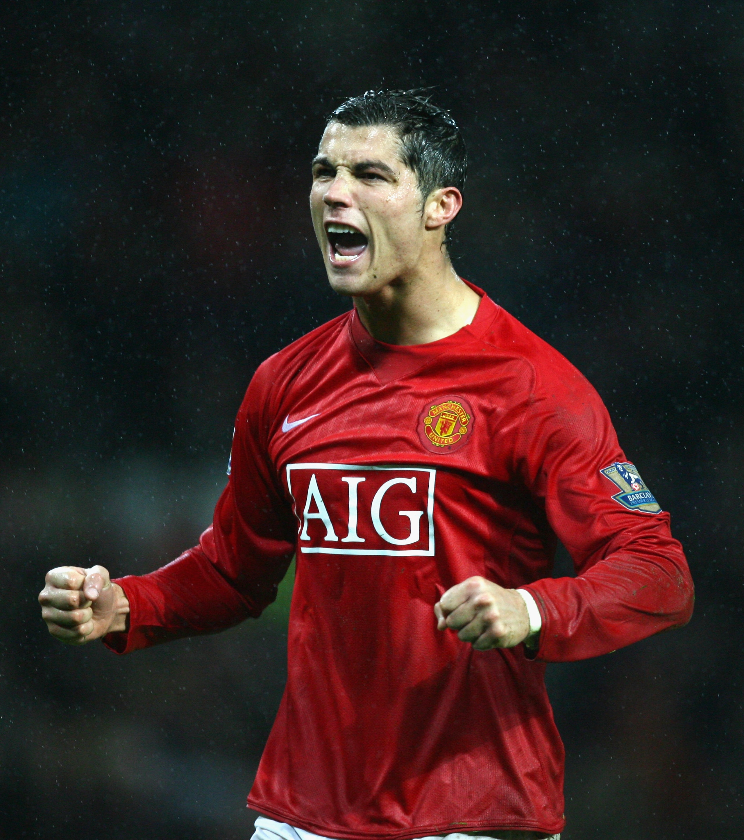 MANCHESTER, UNITED KINGDOM - DECEMBER 08: Cristiano Ronaldo of Manchester United celebrates scoring his team's fourth goal from the penalty spot during the Barclays Premier League match between Manchester United and Derby County at Old Trafford on Decembe