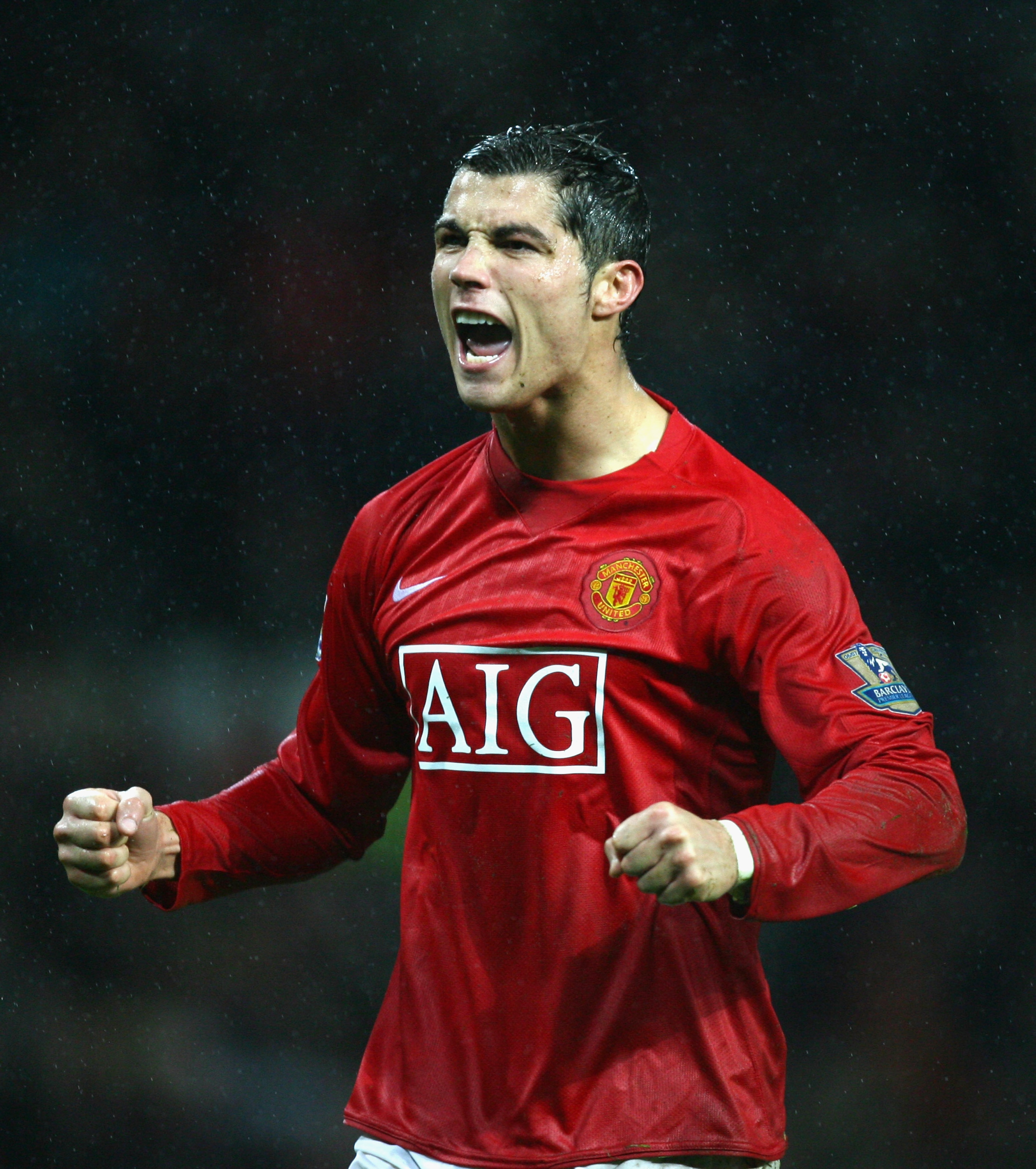 MANCHESTER, UNITED KINGDOM - DECEMBER 08: Cristiano Ronaldo of Manchester United celebrates scoring his team's fourth goal from the penalty spot during the Barclays Premier League match between Manchester United and Derby County at Old Trafford on Decembe