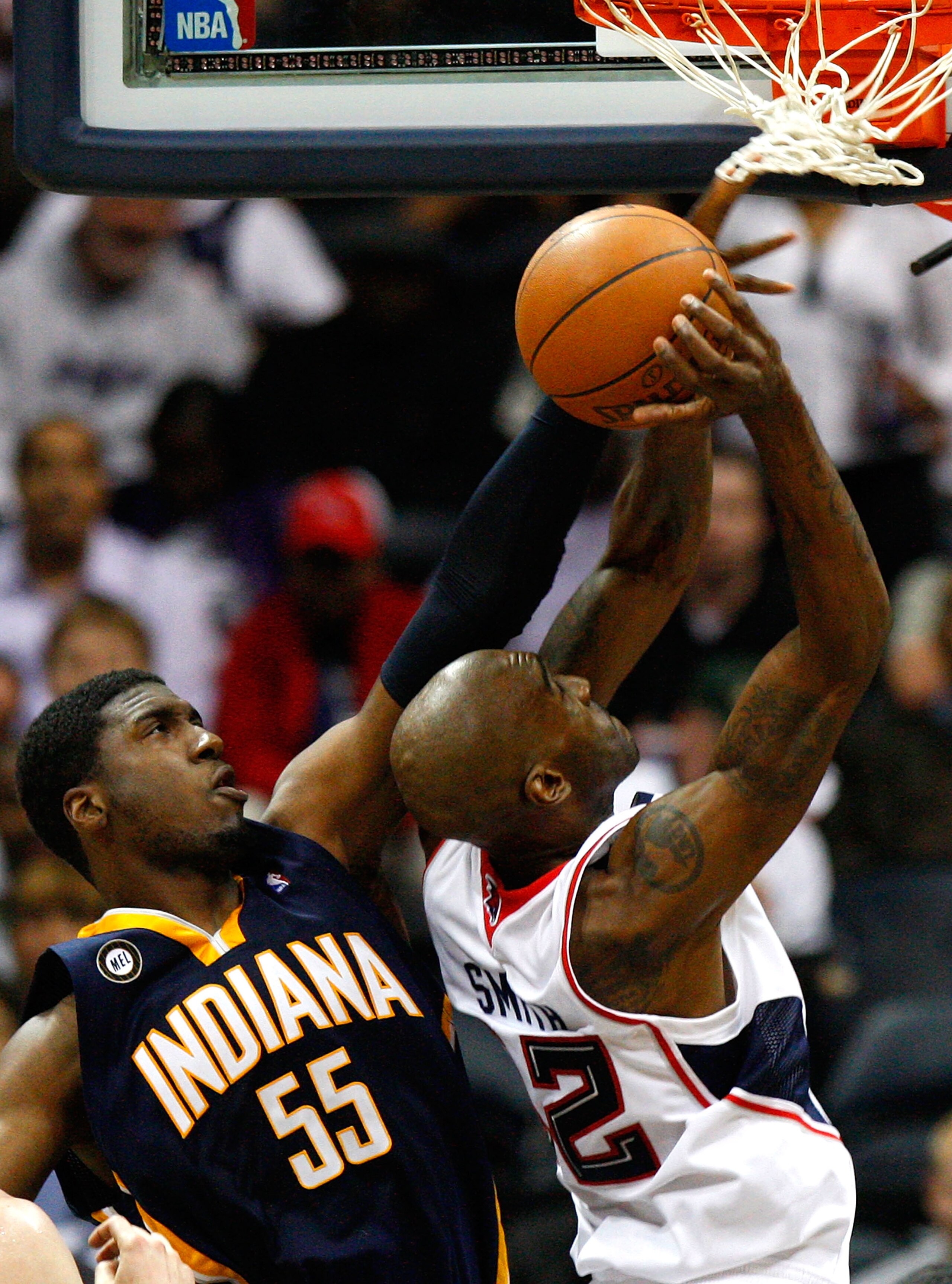 ATLANTA - OCTOBER 28:  Roy Hibbert #55 of the Indiana Pacers defends the basket against Joe Smith #32 of the Atlanta Hawks at Philips Arena on October 28, 2009 in Atlanta, Georgia.  (Photo by Kevin C. Cox/Getty Images)