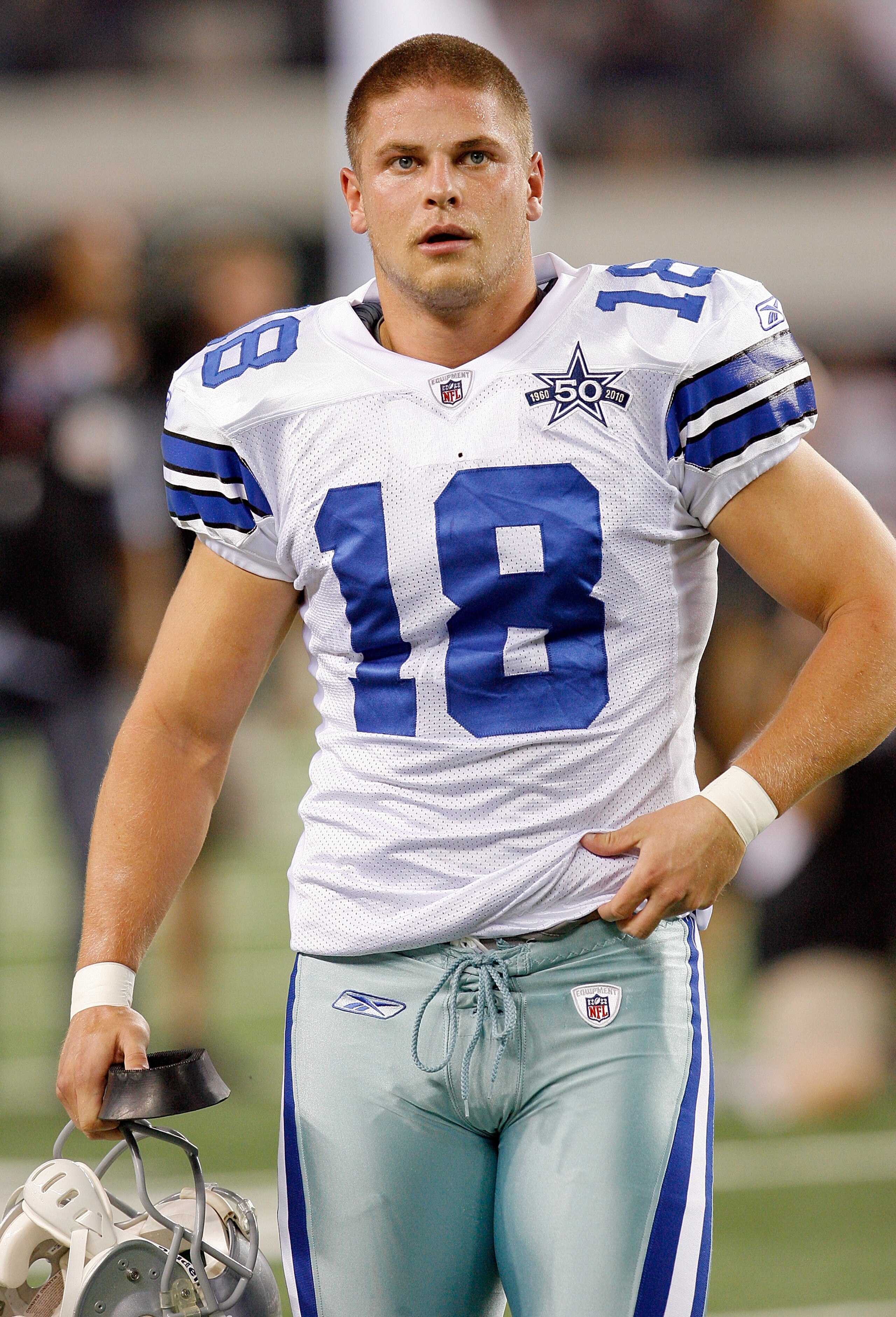 ARLINGTON, TX - AUGUST 12:  David Buehler #18 of the Dallas Cowboys walks off the field during the preseason game against the Oakland Raiders at Dallas Cowboys Stadium on August 12, 2010 in Arlington, Texas.  (Photo by Tom Pennington/Getty Images)