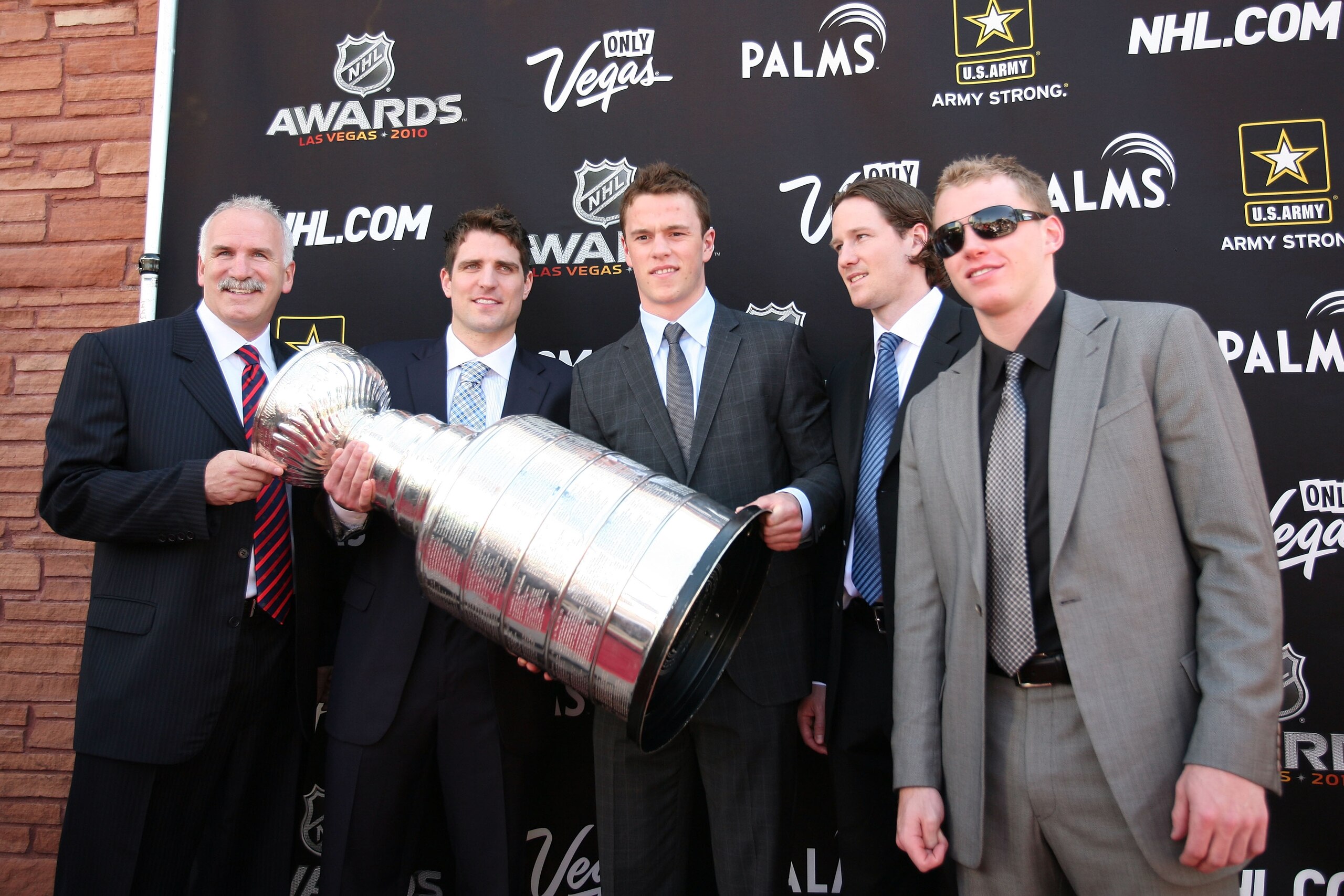 LAS VEGAS - JUNE 23:  Joel Quenneville, Patrick Sharp, Jonathan Toews, Duncan Keith and Patrick Kane hold the Stanely Cup during the red carpet arrivals for the 2010 NHL Awards at the Palms Casino Resort on June 23, 2010 in Las Vegas, Nevada.  (Photo by B