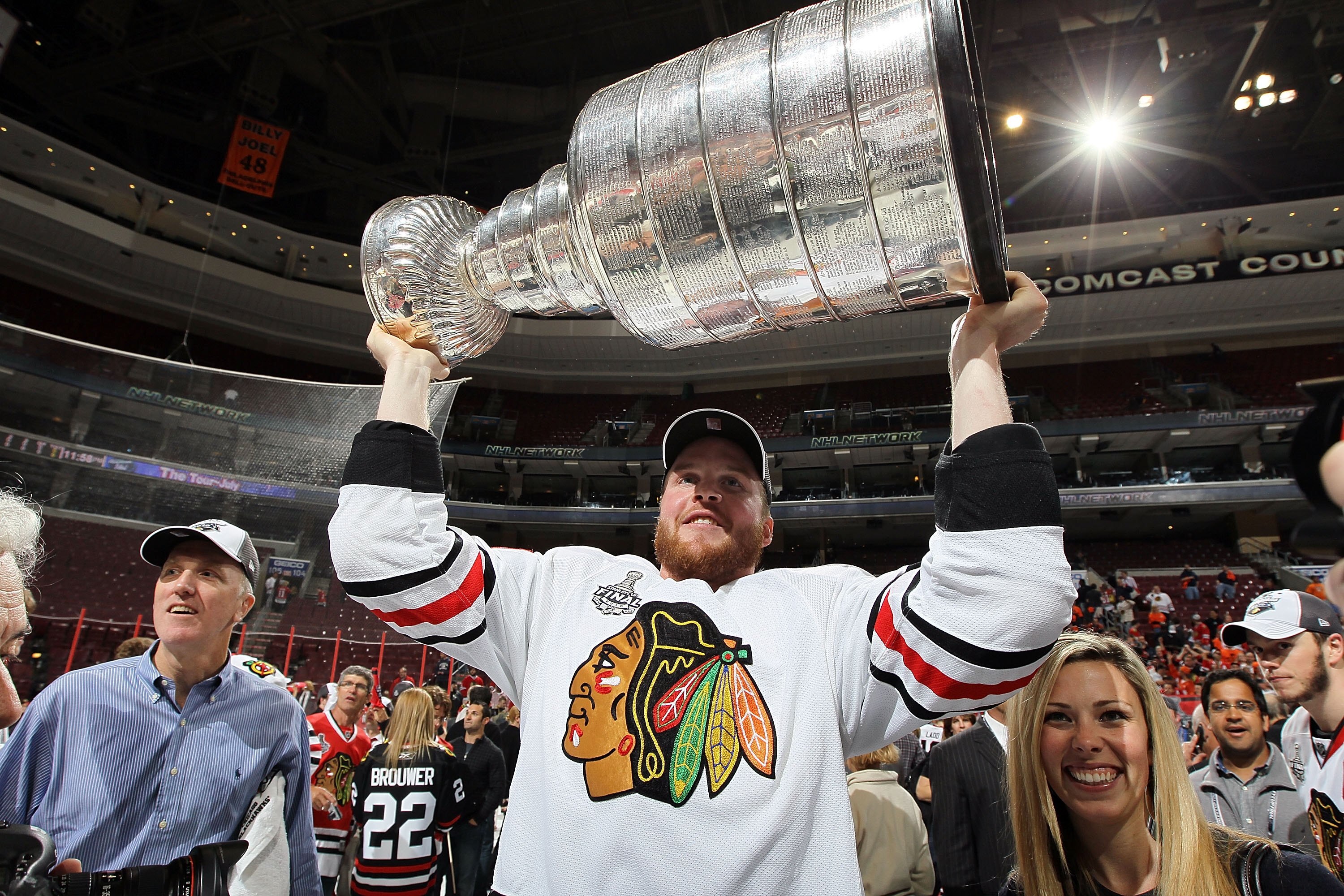PHILADELPHIA - JUNE 09:  Bryan Bickell #29 of the Chicago Blackhawks hoists the Stanley Cup after teammate Patrick Kane scored the game-winning goal in overtime to defeat the Philadelphia Flyers 4-3 and win the Stanley Cup in Game Six of the 2010 NHL Stan