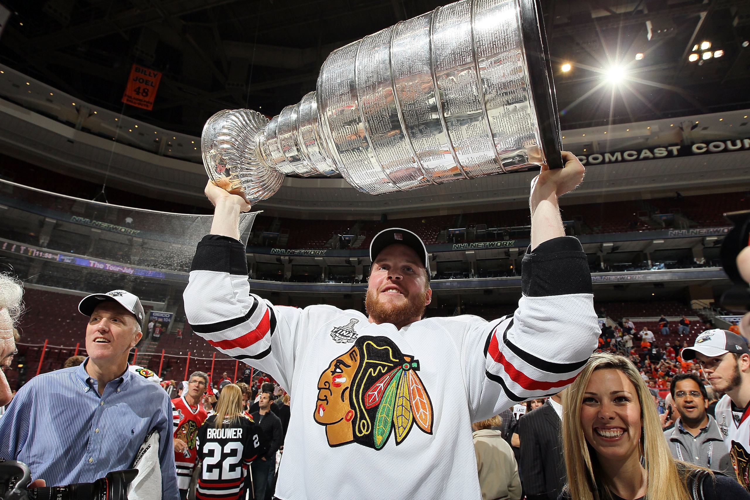 PHILADELPHIA - JUNE 09:  Bryan Bickell #29 of the Chicago Blackhawks hoists the Stanley Cup after teammate Patrick Kane scored the game-winning goal in overtime to defeat the Philadelphia Flyers 4-3 and win the Stanley Cup in Game Six of the 2010 NHL Stan