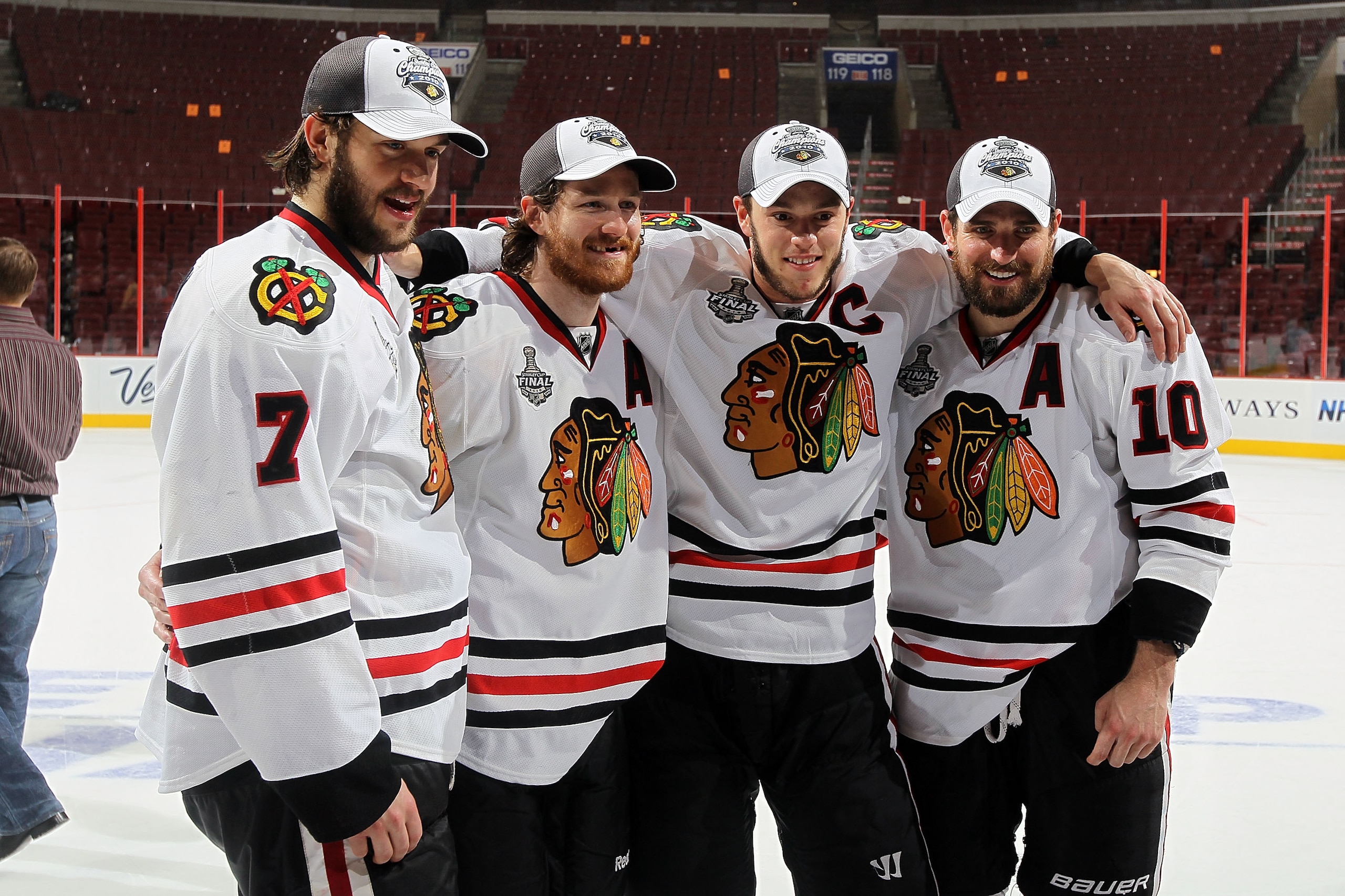 PHILADELPHIA - JUNE 09:  Brent Seabrook #7, Duncan Keith #2, Jonathan Toews #19 and Patrick Sharp #10 of the Chicago Blackhawks celebrate after the Blackhawks defeated the Philadelphia Flyers 4-3 in overtime to win the Stanley Cup in Game Six of the 2010 