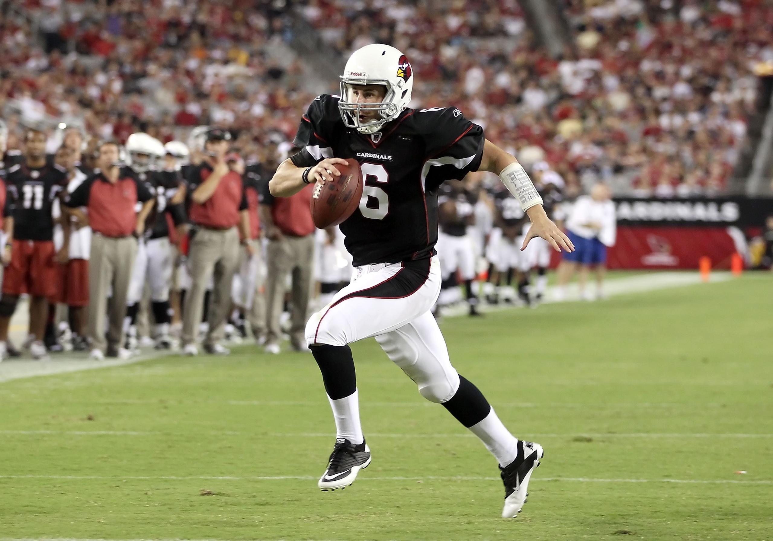 GLENDALE, AZ - SEPTEMBER 02:  Quarterback Max Hall #6 of the Arizona Cardinals scrambles for a 6 yard touchdown against the Washington Redskins during the third quarter of the preseason NFL game at the University of Phoenix Stadium on September 2, 2010 in