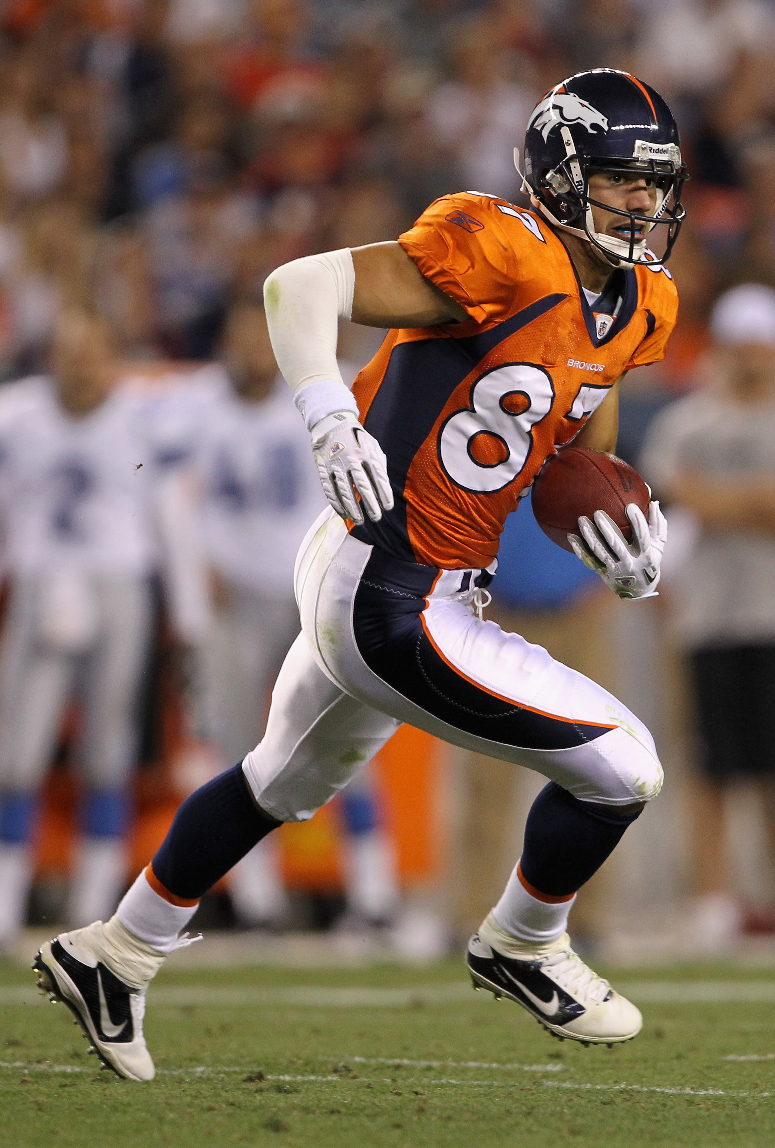 DENVER - AUGUST 21:  Wide receiver Eric Decker #87 of the Denver Broncos makes a reception against the Detroit Lions during preseason NFL action at INVESCO Field at Mile High on August 21, 2010 in Denver, Colorado. The Lions defeated the Broncos 25-20.  (