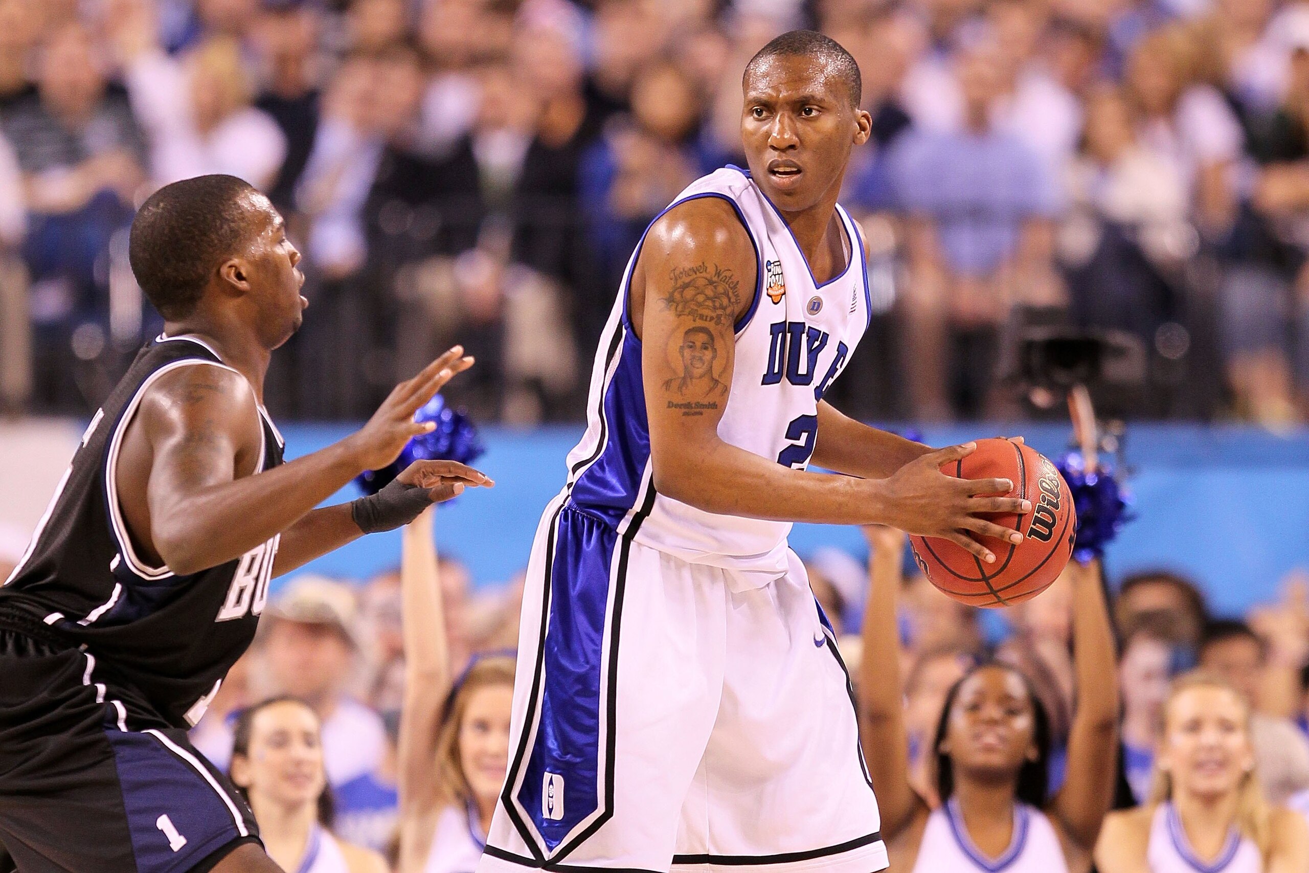 INDIANAPOLIS - APRIL 05:  Nolan Smith #2 of the Duke Blue Devils looks to pass the ball against Shelvin Mack #1 of the Butler Bulldogs during the 2010 NCAA Division I Men's Basketball National Championship game at Lucas Oil Stadium on April 5, 2010 in Ind