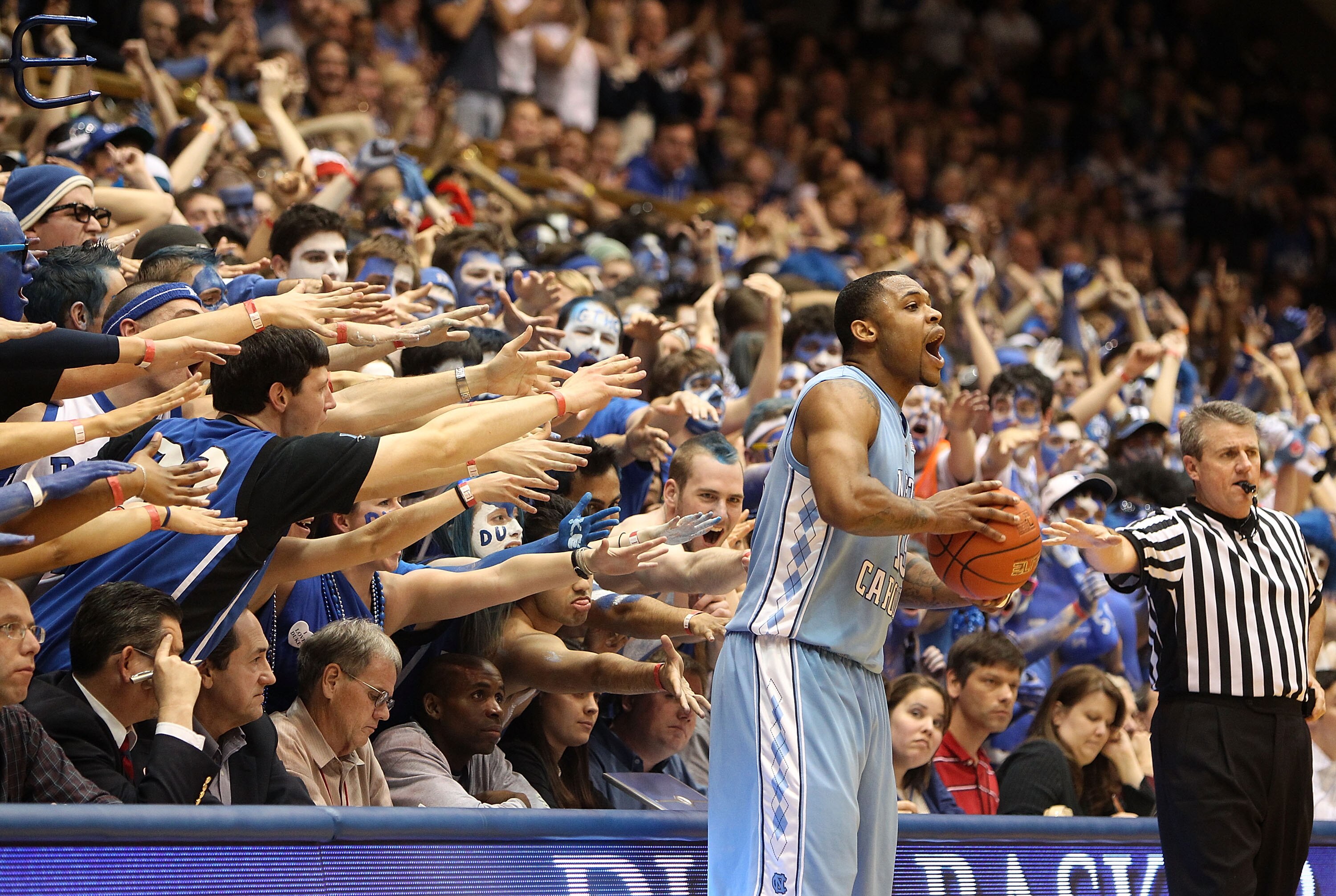 DURHAM, NC - MARCH 06:  Will Graves #13 of the North Carolina Tar Heels tries to throw the ball in bounds against the Duke Blue Devils during their game at Cameron Indoor Stadium on March 6, 2010 in Durham, North Carolina.  (Photo by Streeter Lecka/Getty 