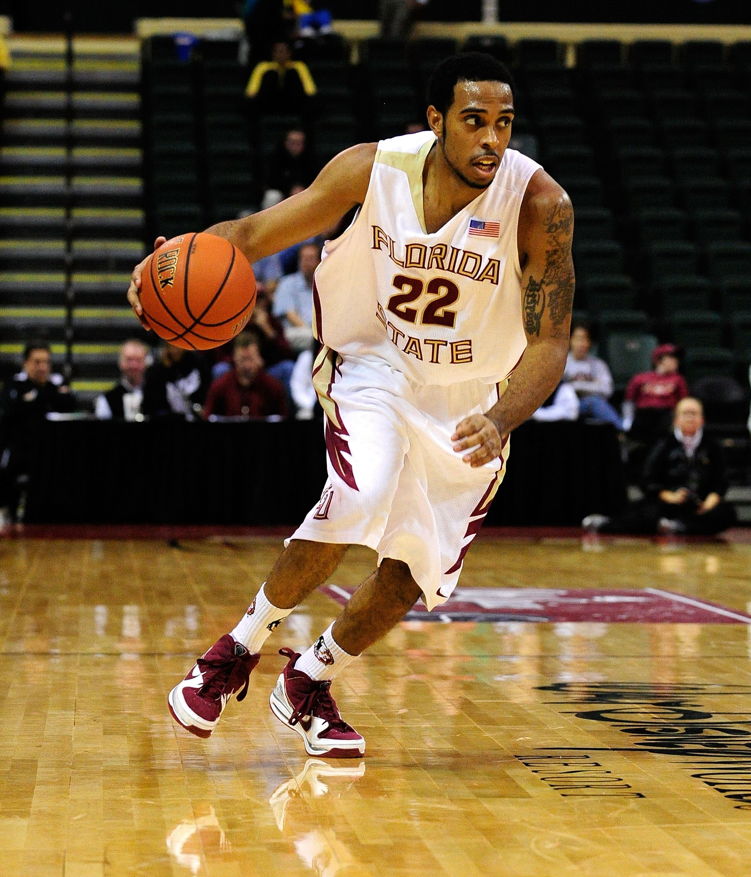 ORLANDO, FL - NOVEMBER 27:  Derwin Kitchen #22 of the Florida State Seminoles drives against the Alabama Crimson Tide during the Old Spice Classic at Disney's Milk House on November 27, 2009 in Orlando, Florida.  (Photo by Sam Greenwood/Getty Images)