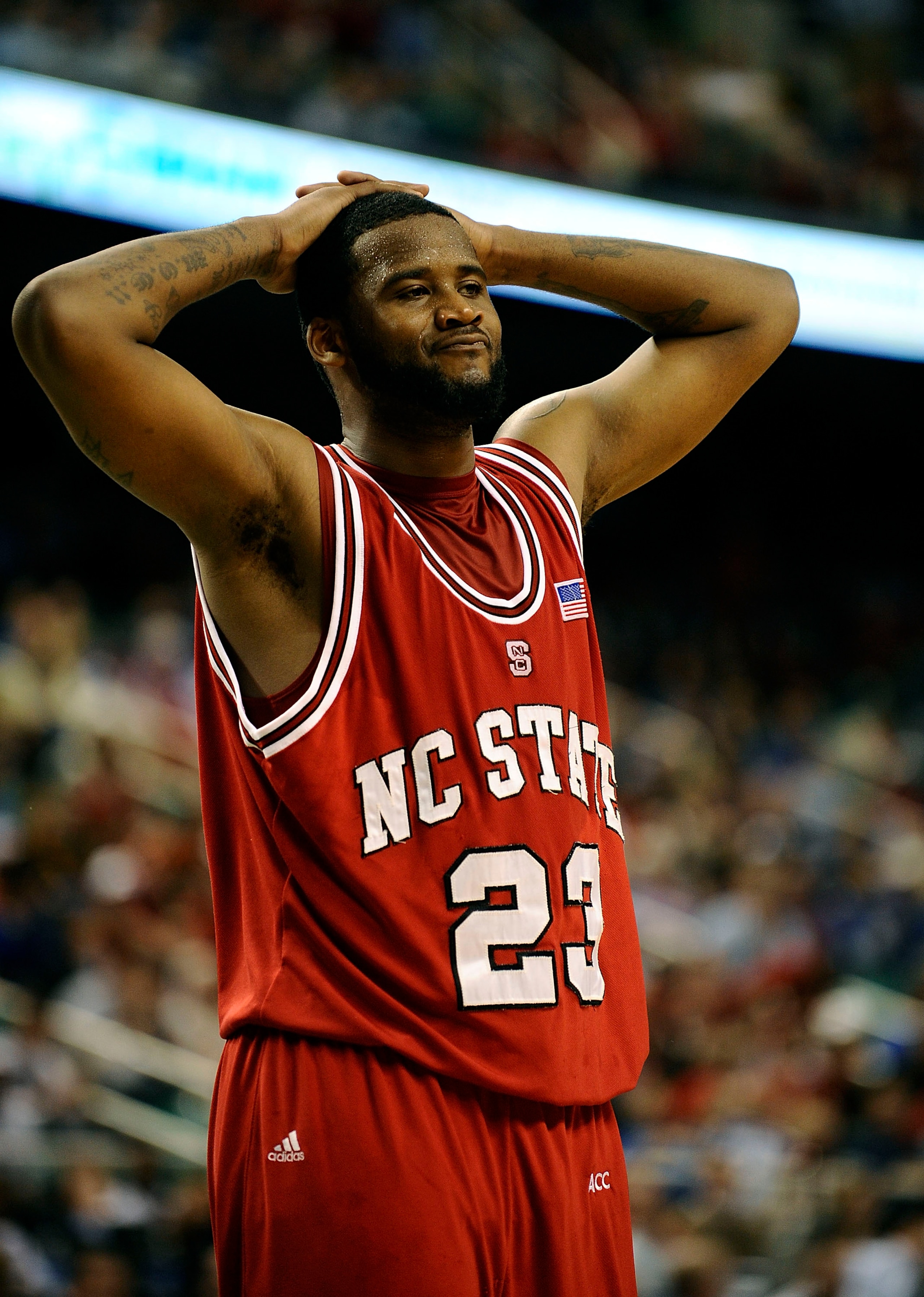 GREENSBORO, NC - MARCH 13:  Tracy Smith #23 of the North Carolina State Wolfpack reacts in a semifinal game against the Georgia Tech Yellow Jackets in the 2010 ACC Men's Basketball Tournament at the Greensboro Coliseum on on March 13, 2010 in Greensboro, 