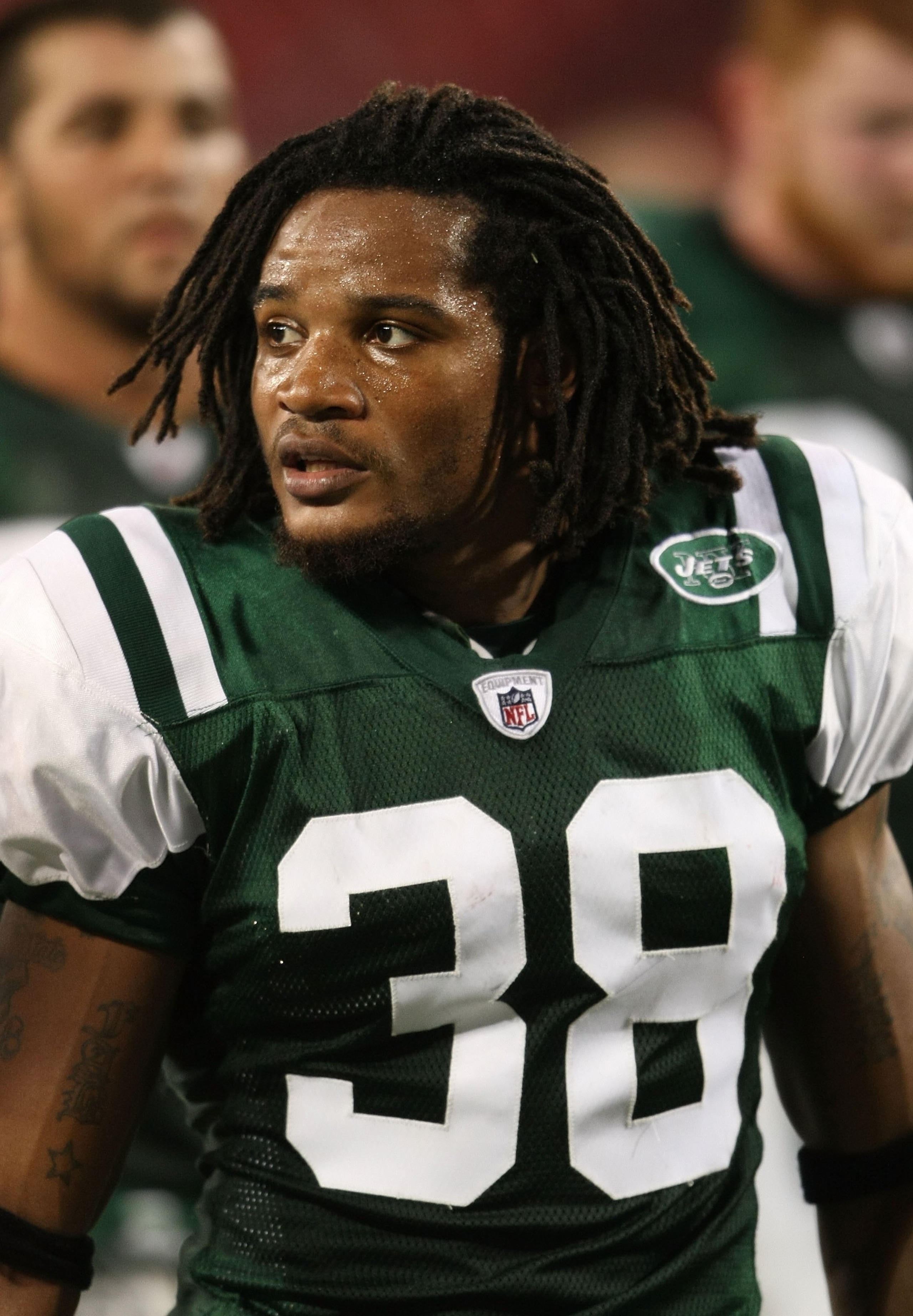 EAST RUTHERFORD, NJ - AUGUST 14: Emanuel Cook #38 of the New York Jets walks off the field against the St. Louis Rams during their preseason game at Giants Stadium on August 14, 2009  in East Rutherford, New Jersey.  (Photo by Nick Laham/Getty Images)