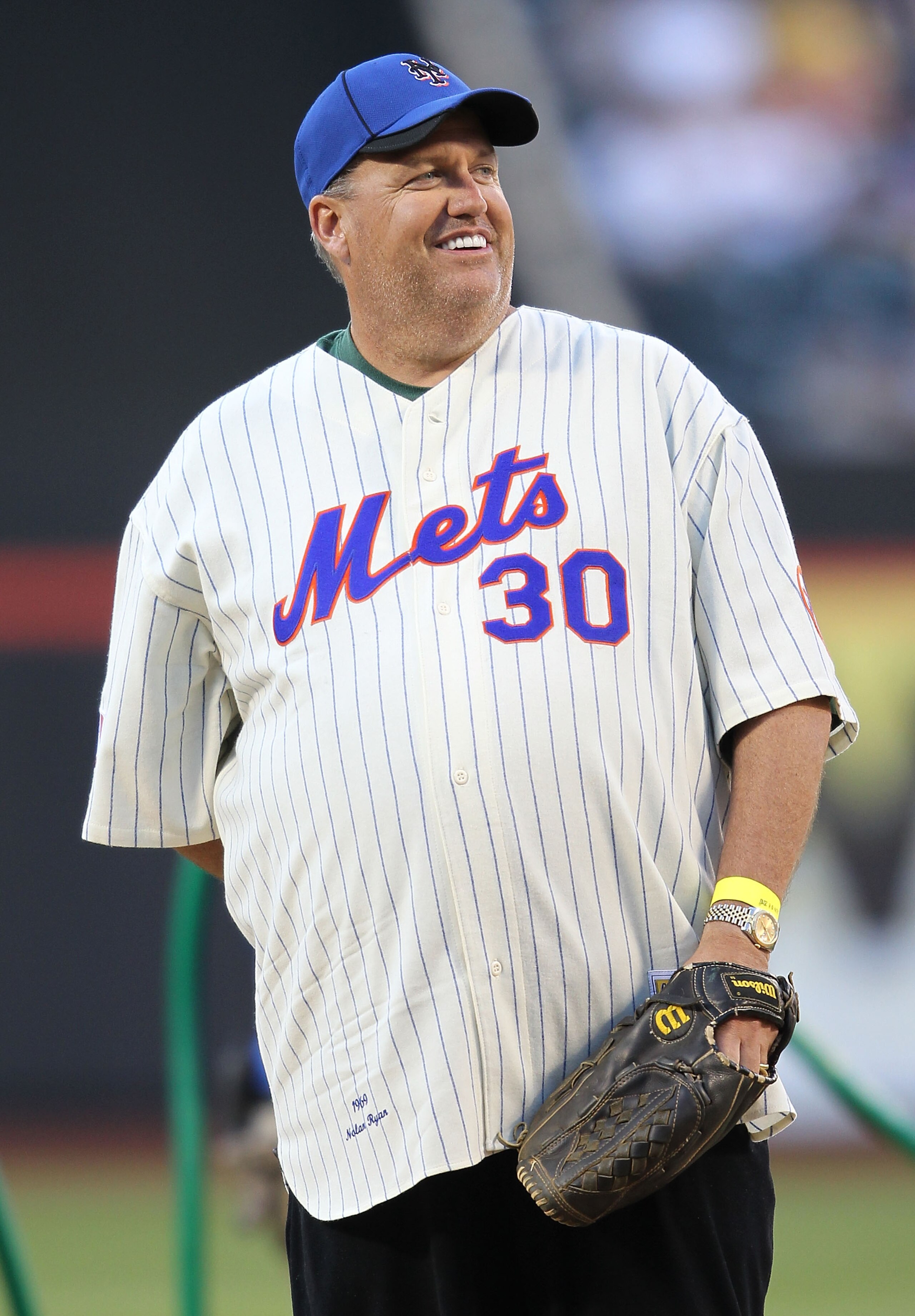 NEW YORK - JUNE 08:  New York Jets head coach, Rex Ryan, throws out the ceremonial first pitch prior to the game between the New York Mets and the San Diego Padres on June 8, 2010 in the Flushing neighborhood of the Queens borough of New York City.  (Phot