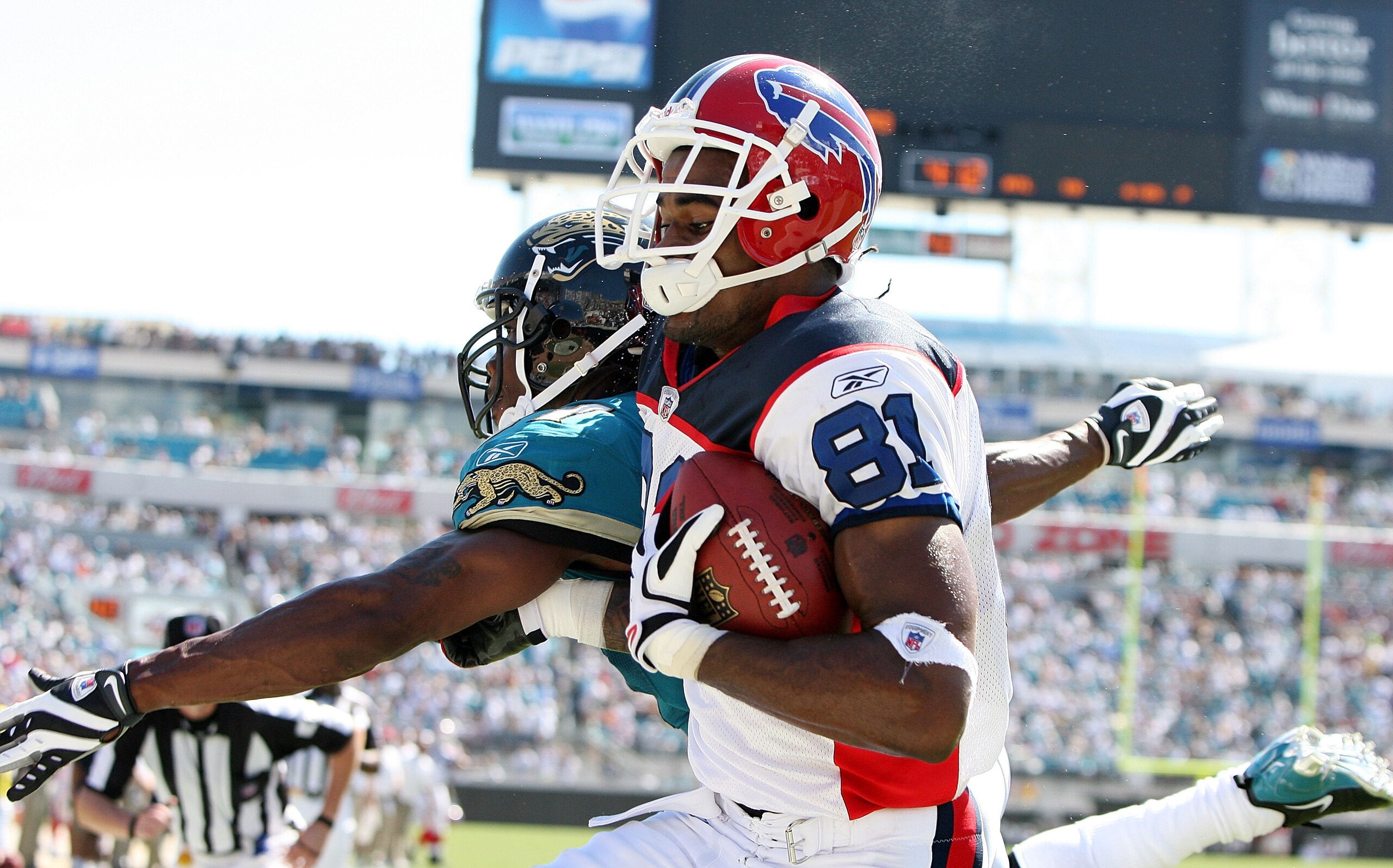 JACKSONVILLE, FL - SEPTEMBER 14:  Wide receiver James Hardy #81 of the Buffalo Bills comes down with a touchdown catch late in the fourth quarter over Rashean Mathis #27 of the Jacksonville Jaguars at Jacksonville Municipal Stadium on September 14, 2008 i