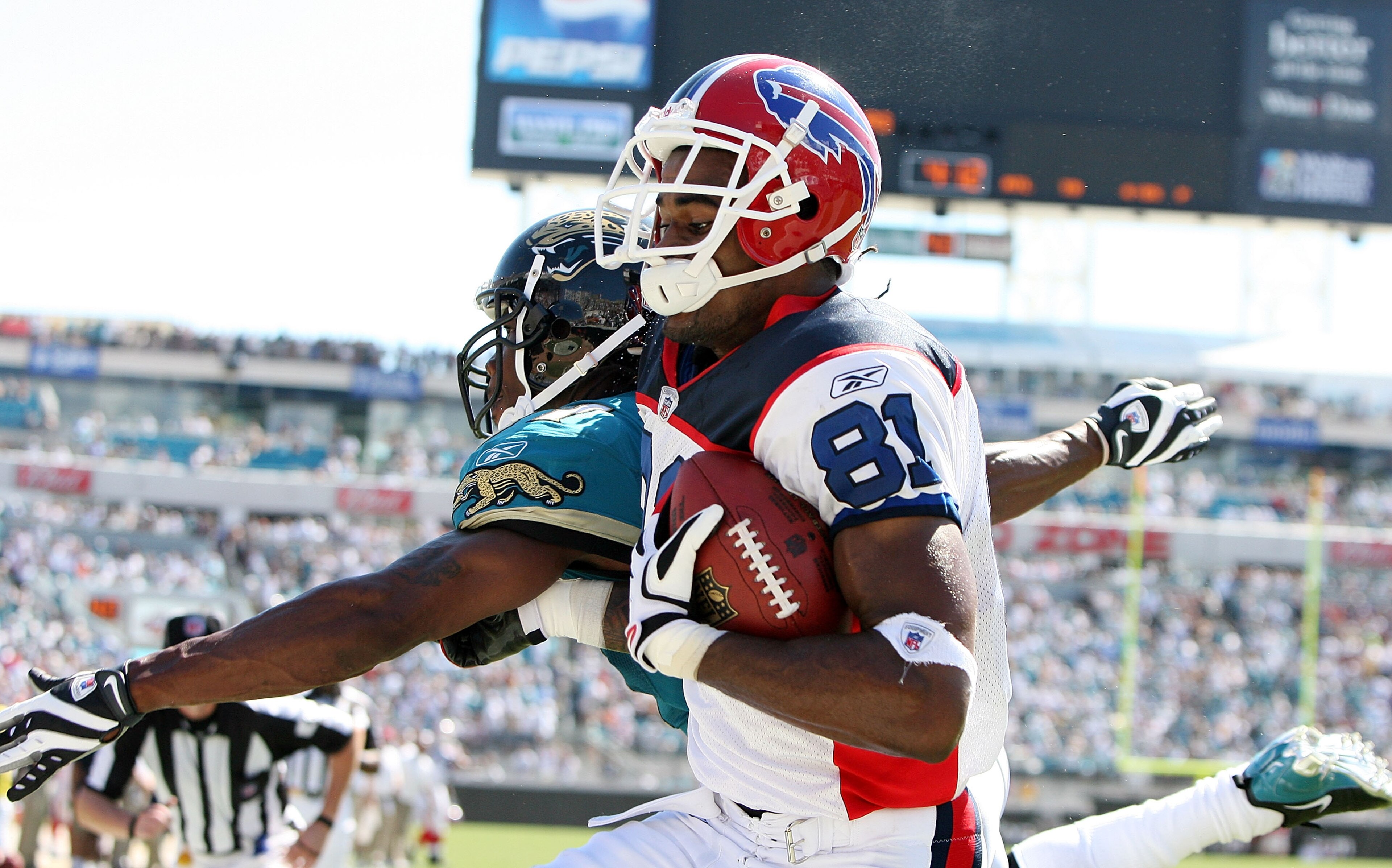 JACKSONVILLE, FL - SEPTEMBER 14:  Wide receiver James Hardy #81 of the Buffalo Bills comes down with a touchdown catch late in the fourth quarter over Rashean Mathis #27 of the Jacksonville Jaguars at Jacksonville Municipal Stadium on September 14, 2008 i