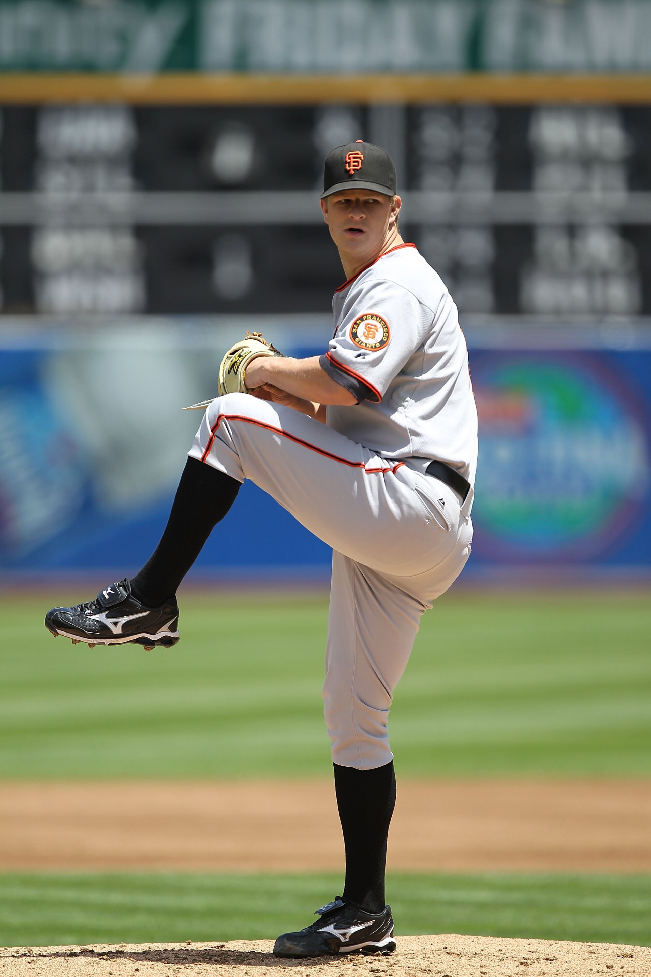 OAKLAND, CA - MAY 22:  Matt Cain #18 of the San Francisco Giants pitches against the Oakland Athletics during an MLB game at the Oakland-Alameda County Coliseum on May 22, 2010 in Oakland, California.  (Photo by Jed Jacobsohn/Getty Images)