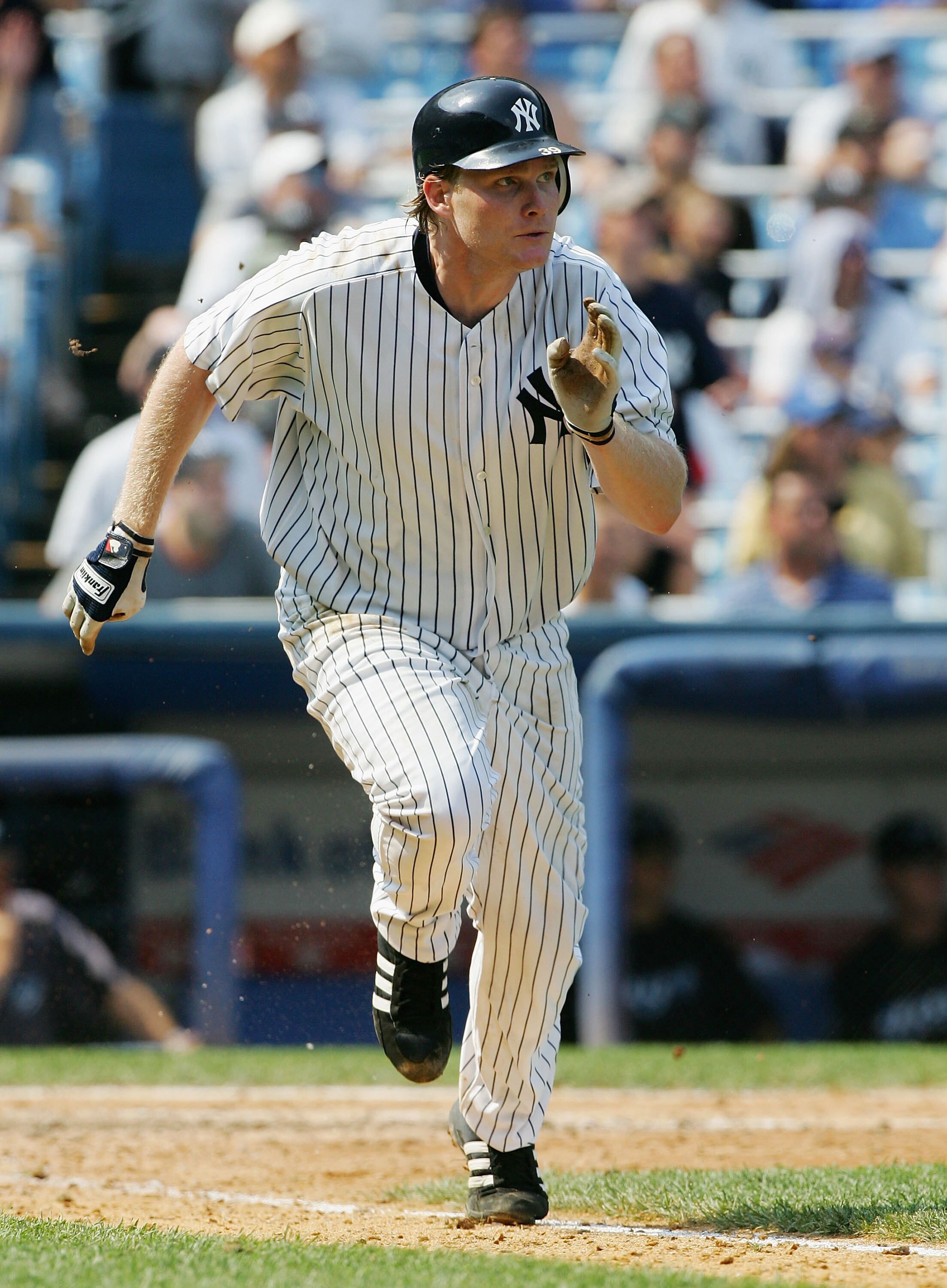NEW YORK - AUGUST 03:  Craig Wilson #39 of the New York Yankees runs to first base against the Toronto Blue Jays at Yankee Stadium on August 3, 2006 in the Bronx borough of New York City. The Yankees defeated the Blue Jays 8-1.(Photo by Jim McIsaac/Getty