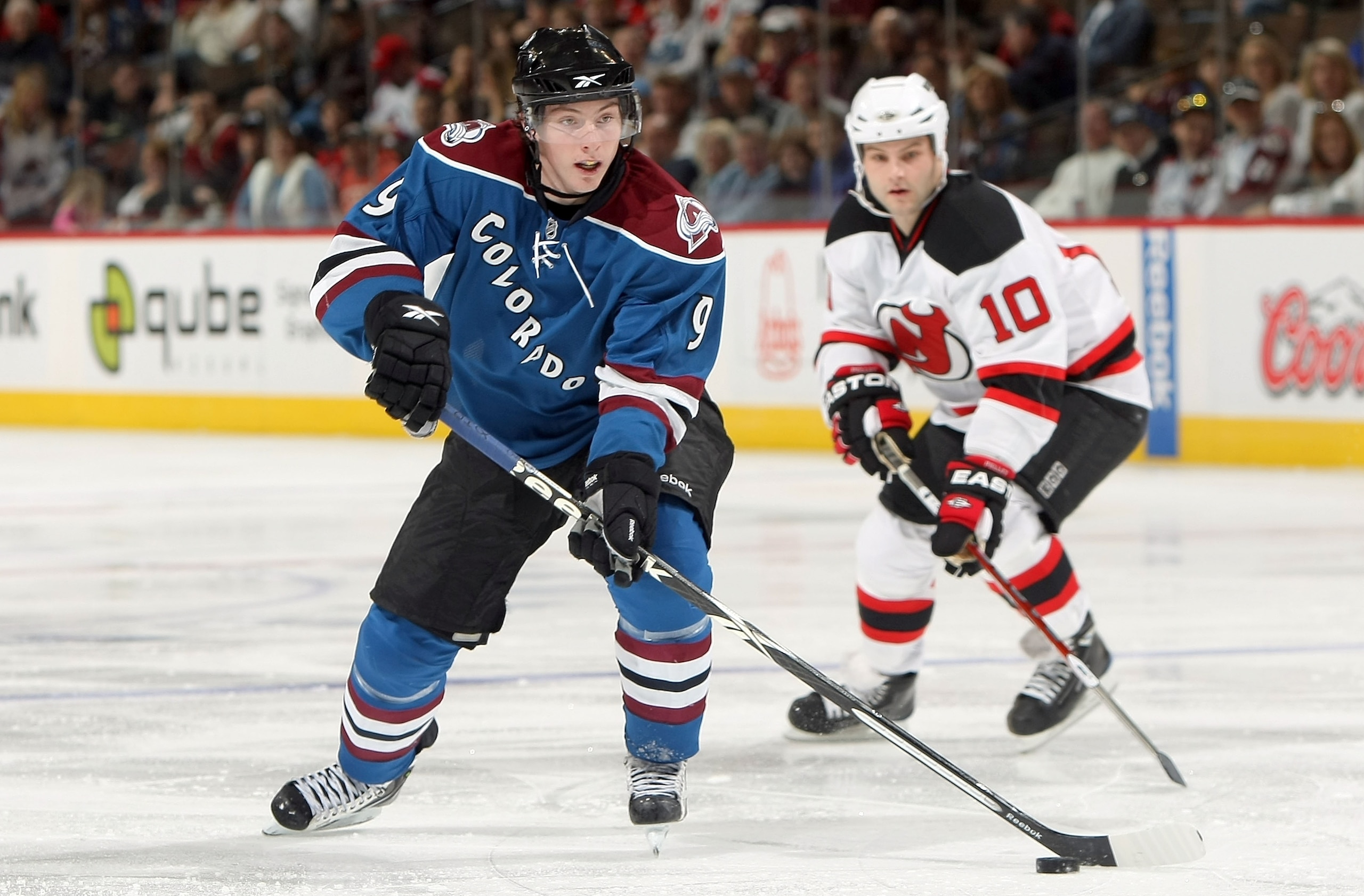 DENVER - JANUARY 16:  Matt Duchene #9 of the Colorado Avalanche controls the puck against Rod Pelley #10 of the New Jersey Devils during NHL action at the Pepsi Center on January 16, 2010 in Denver, Colorado. The Avalanche defeated the Devils 3-1.  (Photo