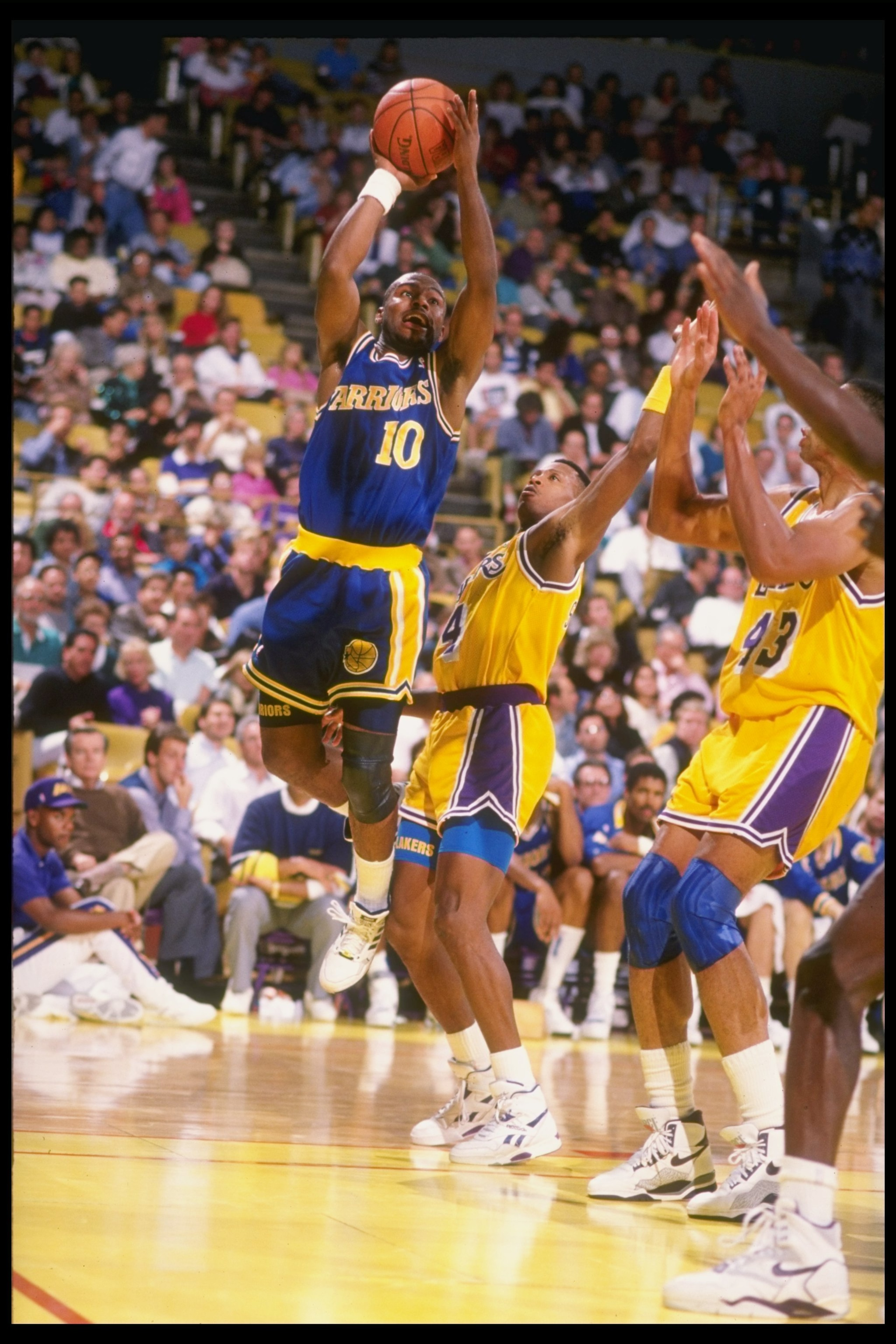 1990-1991: Guard Tim Hardaway of the Golden State Warriors leaps into the air during a game against the Los Angeles Lakers at the Great Western Forum in Inglewood, California. Mandatory Credit: Ken Levine /Allsport 1990-1991: Guard Tim Hardaway of the Golden State Warriors leaps into the air during a game against the Los Angeles Lakers at the Great Western Forum in Inglewood, California. Mandatory Credit: Ken Levine /Allsport