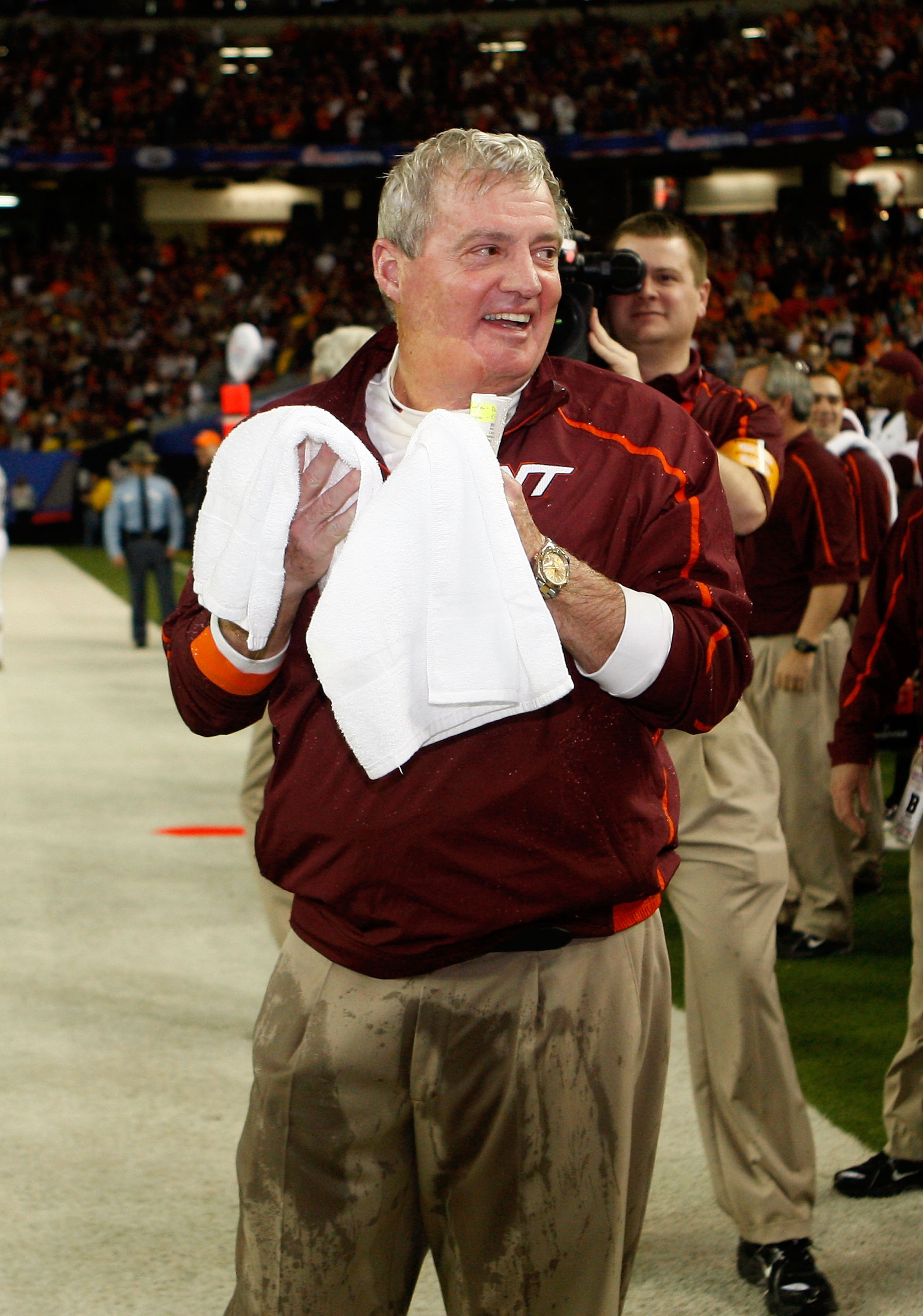 ATLANTA - DECEMBER 31:  Head coach Frank Beamer of the Virginia Tech Hokies dries himself after being dunked with sports drink during the Chick-Fil-A Bowl against the Tennessee Volunteers at the Georgia Dome on December 31, 2009 in Atlanta, Georgia.  The 