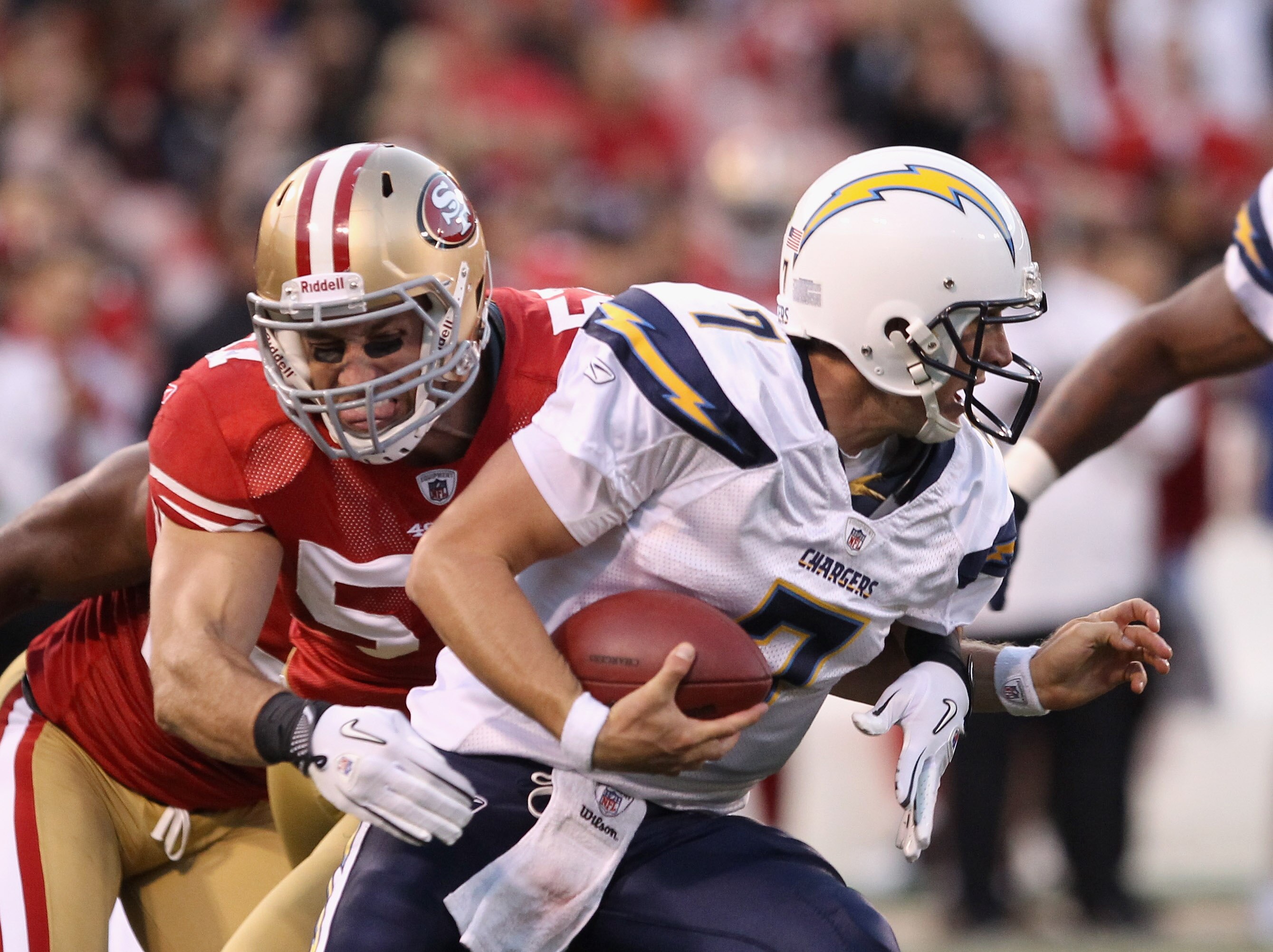 SAN FRANCISCO - SEPTEMBER 02:  Billy Volek #7 of the San Diego Chargers is sacked by Matt Wilhelm #57 of the San Francisco 49ers at Candlestick Park  on September 2, 2010 in San Francisco, California.  (Photo by Ezra Shaw/Getty Images)