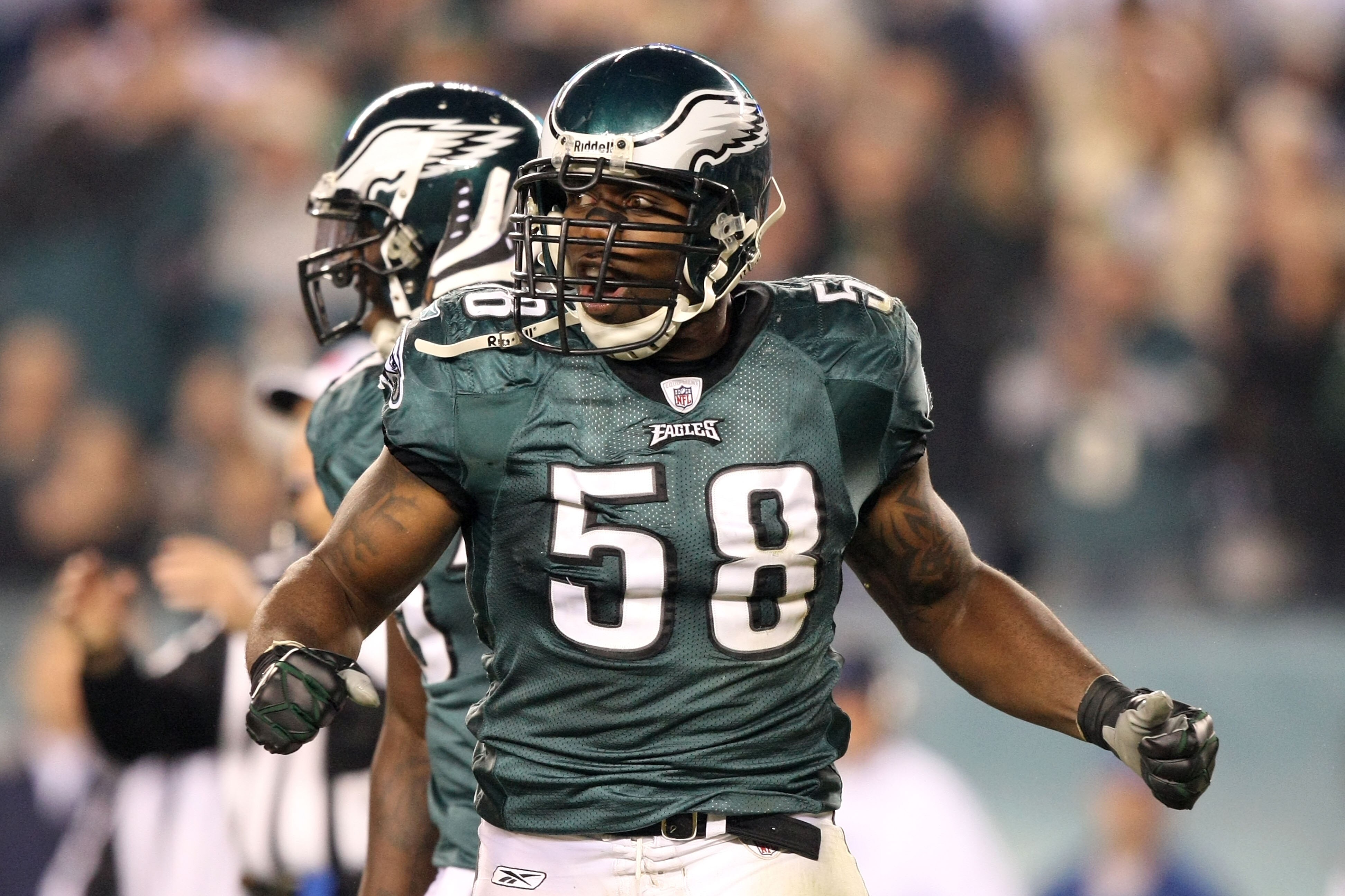 PHILADELPHIA - NOVEMBER 08: Trent Cole #58 of the Philadelphia Eagles celebrates after he sacked Tony Romo #9 of the Dallas Cowboys in the third quarter at Lincoln Financial Field on November 8, 2009 in Philadelphia, Pennsylvania. (Photo by Al Bello/Get PHILADELPHIA - NOVEMBER 08: Trent Cole #58 of the Philadelphia Eagles celebrates after he sacked Tony Romo #9 of the Dallas Cowboys in the third quarter at Lincoln Financial Field on November 8, 2009 in Philadelphia, Pennsylvania. (Photo by Al Bello/Get