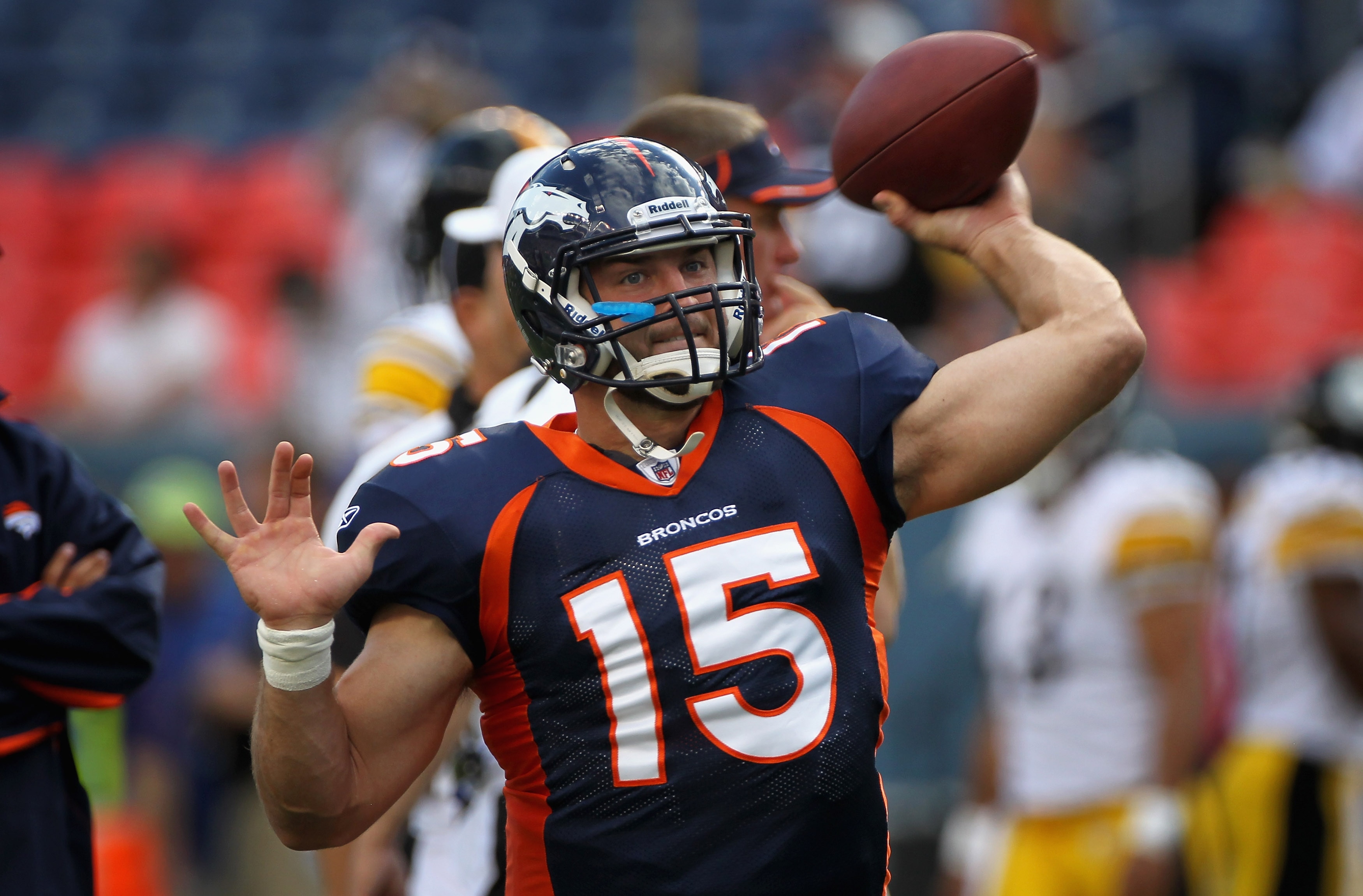 DENVER - AUGUST 29: Quarterback Tim Tebow #15 of the Denver Broncos warms up prior to facing the Pittsburgh Steelers during preseason NFL action at INVESCO Field at Mile High on August 29, 2010 in Denver, Colorado. (Photo by Doug Pensinger/Getty Images) DENVER - AUGUST 29: Quarterback Tim Tebow #15 of the Denver Broncos warms up prior to facing the Pittsburgh Steelers during preseason NFL action at INVESCO Field at Mile High on August 29, 2010 in Denver, Colorado. (Photo by Doug Pensinger/Getty Images)