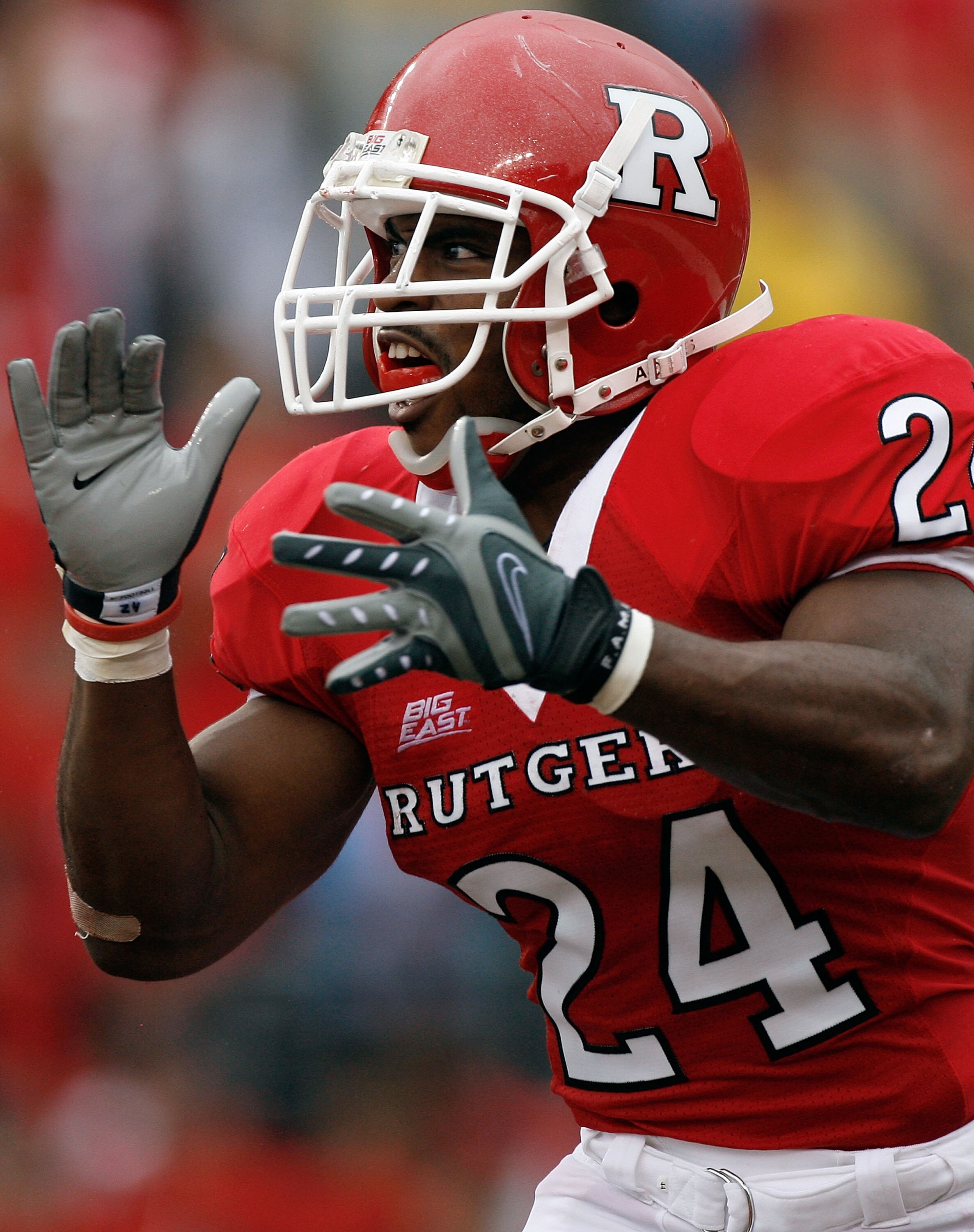 PISCATAWAY, NJ - SEPTEMBER 27: Running back Mason Robinson #24 of the Rutgers Scarlet Knights celebrates a touchdown against the Morgan State Bears during the first quarter at Rutgers Stadium on September 27, 2008 in Piscataway, New Jersey.  (Photo by Jar