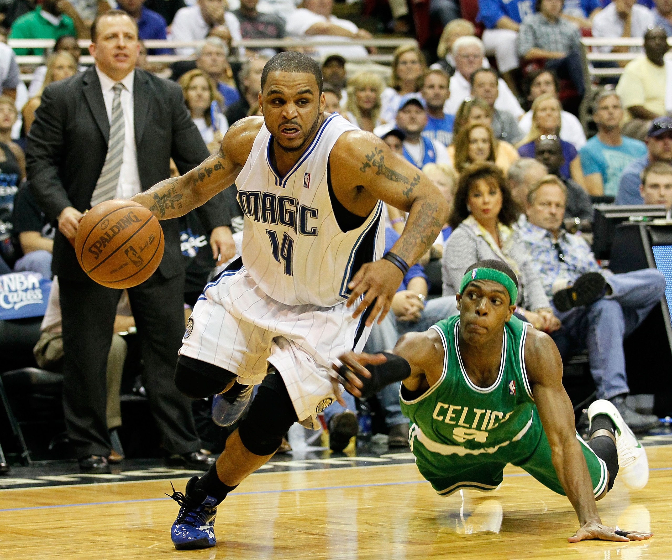 ORLANDO, FL - MAY 16:  Jameer Nelson #14 of the Orlando Magic drives past Rajon Rondo #9 of the Boston Celtics in Game One of the Eastern Conference Finals during the 2010 NBA Playoffs at Amway Arena on May 16, 2010 in Orlando, Florida.  NOTE TO USER: Use