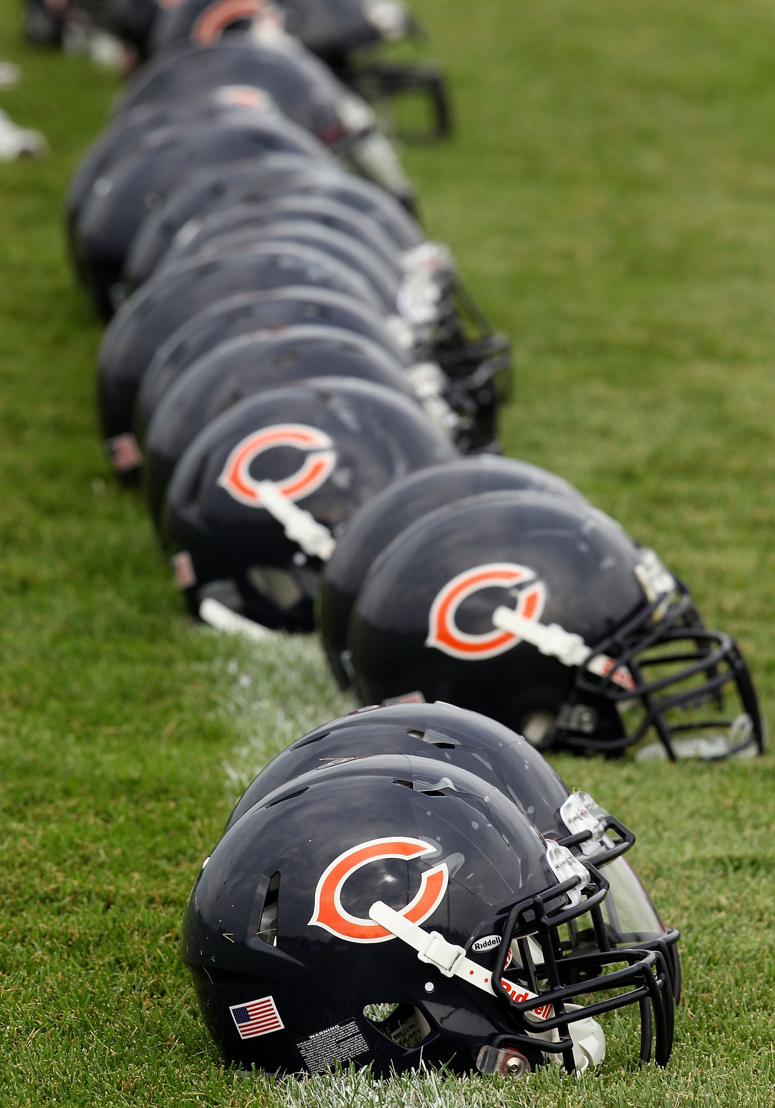 BOURBONNAIS, IL - JULY 30: Helmuts are lined up following Chicago Bears summer training camp practice at Olivet Nazarene University on July 30, 2010 in Bourbonnais, Illinois. (Photo by Jonathan Daniel/Getty Images)