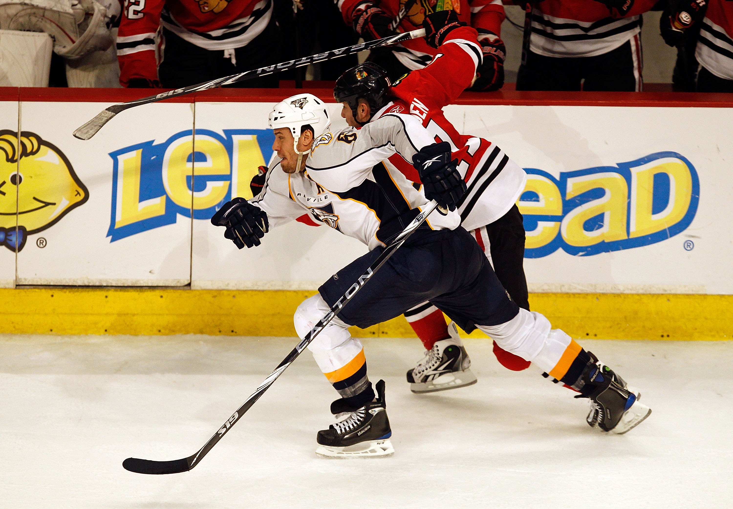 CHICAGO - APRIL 18: Shea Weber #6 of the Nashville Predators and John Madden #11 of the Chicago Blackhawks race up the ice in Game Two of the Western Conference Quarterfinals during the 2010 NHL Stanley Cup Playoffs at the United Center on April 18, 2010 