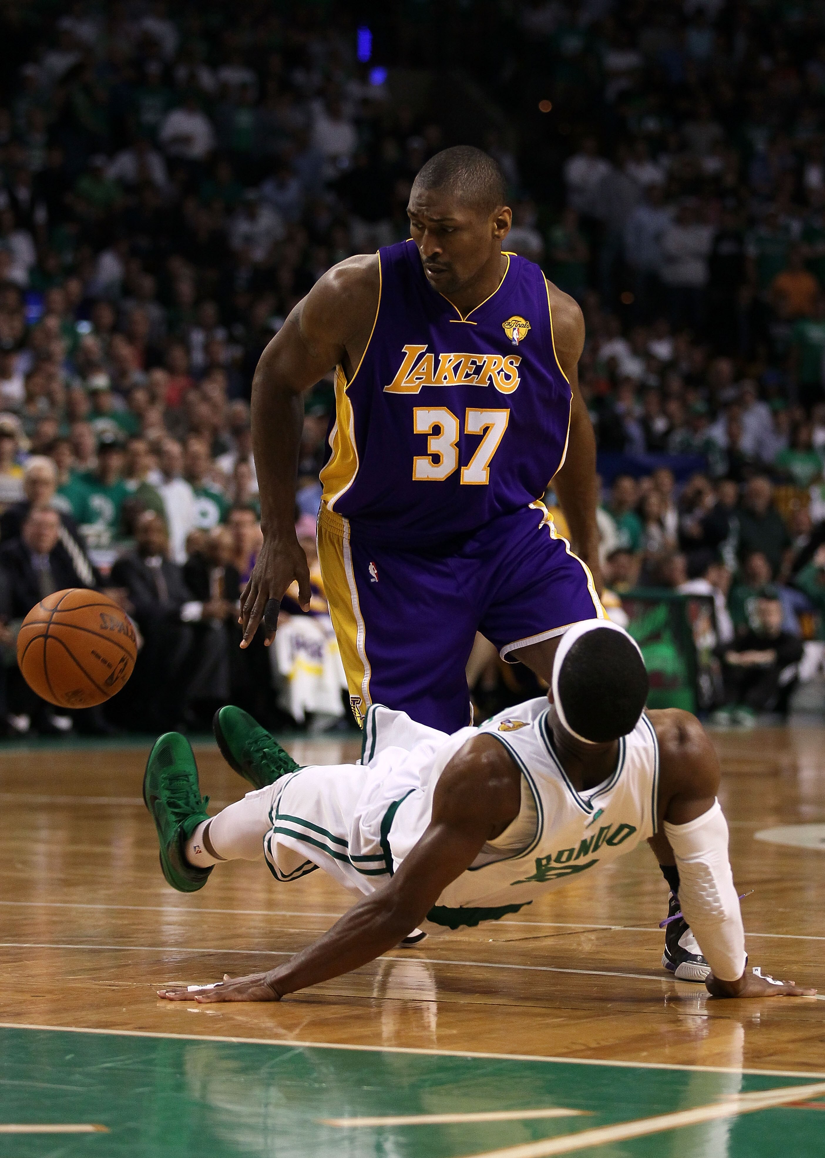 BOSTON - JUNE 08:  Ron Artest #37 of the Los Angeles Lakers drives against Rajon Rondo #9 of the Boston Celtics in the second half of Game Three of the 2010 NBA Finals on June 8, 2010 at TD Garden in Boston, Massachusetts. NOTE TO USER: User expressly ack