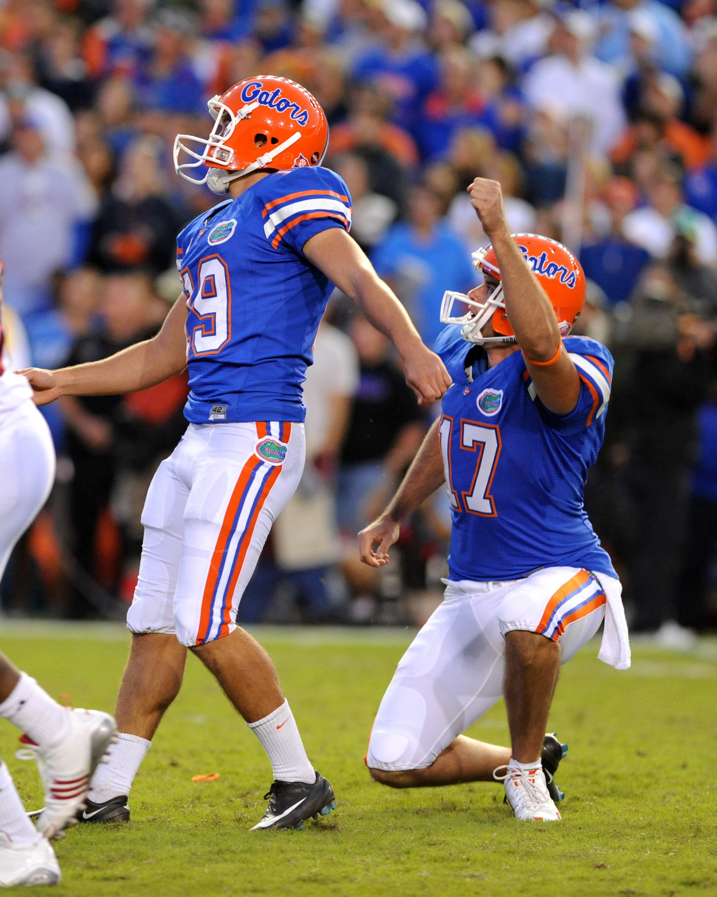 GAINESVILLE, FL - OCTOBER 17: Kicker Caleb Sturgis #19 and holder Chas Henry #17 of the Florida Gators follow a game-winning 27-yard field goal against the University of Arkansas Razorbacks October 17, 2009 at Ben Hill Griffin Stadium in Gainesville, Flor