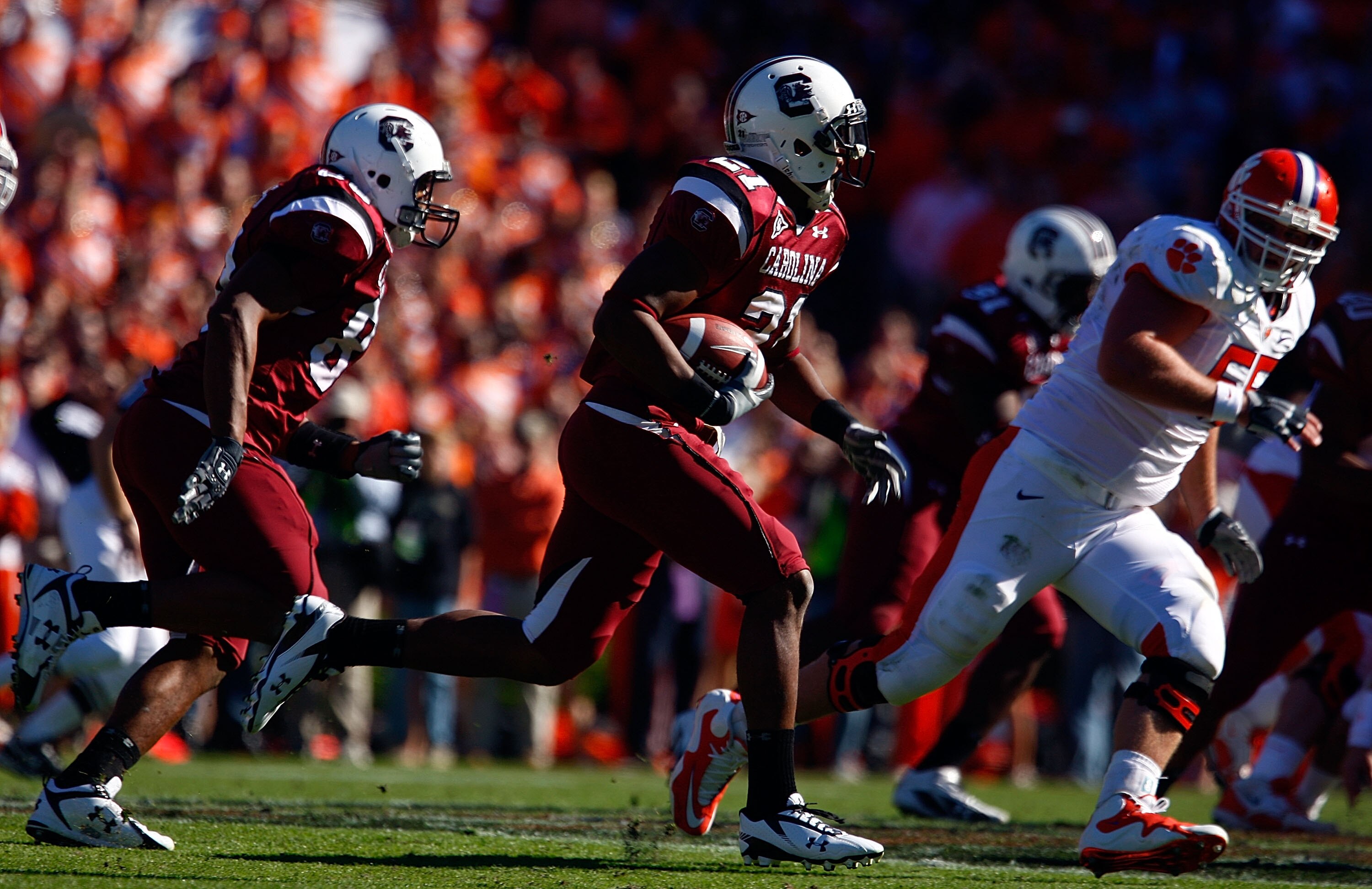 COLUMBIA, SC - NOVEMBER 28:  DeVonte Holloman #21 of the South Carolina Gamecocks returns an interception against the Clemson Tigers at Williams-Brice Stadium on November 28, 2009 in Columbia, South Carolina.  (Photo by Scott Halleran/Getty Images)