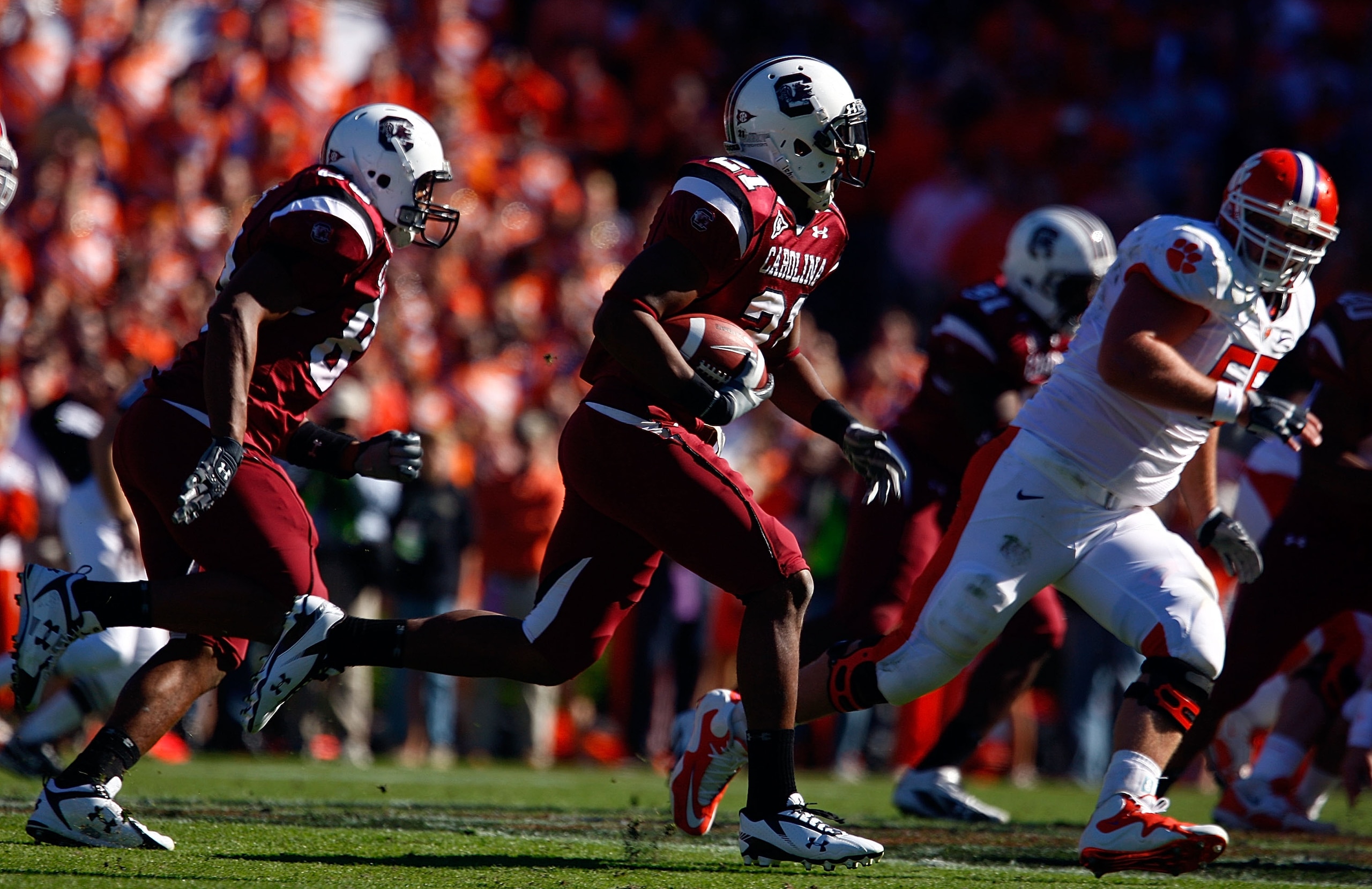 COLUMBIA, SC - NOVEMBER 28:  DeVonte Holloman #21 of the South Carolina Gamecocks returns an interception against the Clemson Tigers at Williams-Brice Stadium on November 28, 2009 in Columbia, South Carolina.  (Photo by Scott Halleran/Getty Images)